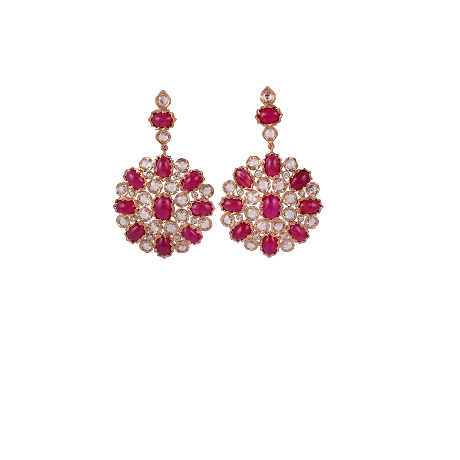 No gemstone represents a celebration more than a bright, red ruby and these amazing chandelier earrings have 20 of them. white Rose cut & full cut  diamonds also hold their own at any festive event. The design of the earrings is classical and will