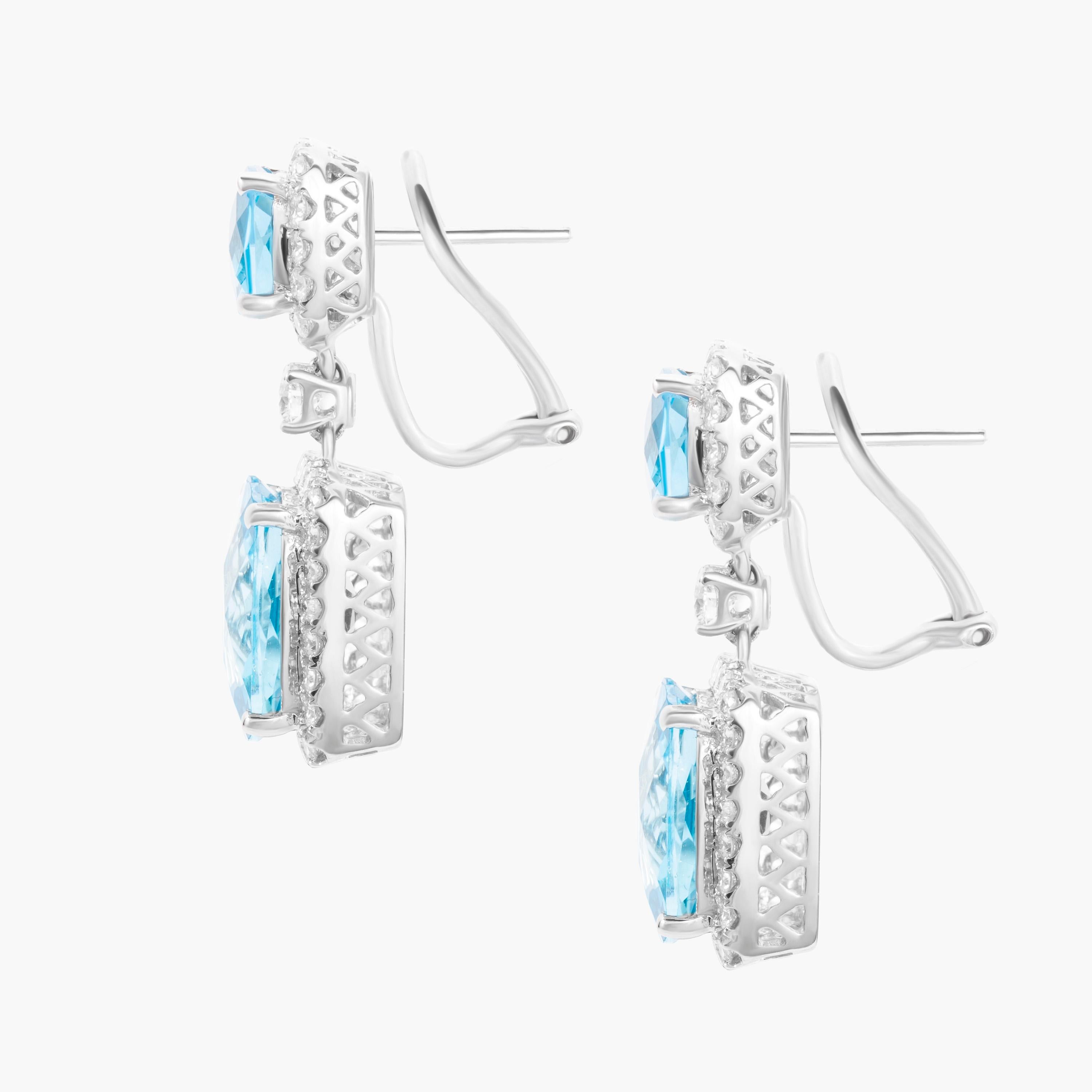 Set in 18K white gold, these drop earrings feature four cushion-cut blue topaz gemstones (total carat weight 14.05 carats) and accented with 1.46 carats of brilliant round diamonds.  Earring length 3cm.

Composition: 
18K White Gold 
4 Blue Topaz: