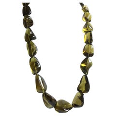 Collier de perles de quartz olive de qualité supérieure de 1407.25 carats