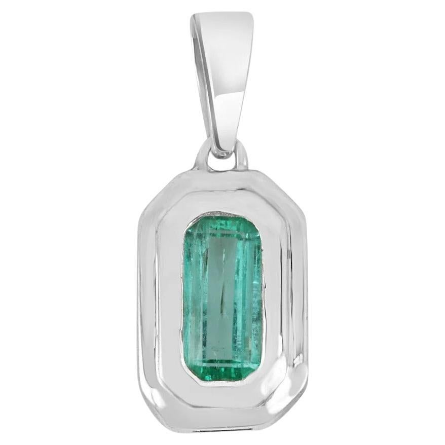 1.40ct .925 Colombian Emerald Elongated Emerald Cut Solitaire Silver Pendant For Sale