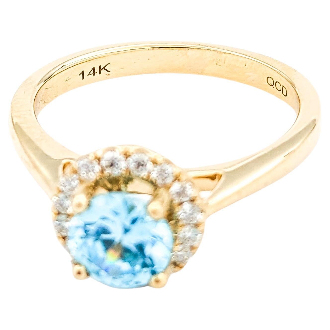 Bague en or jaune avec zircon bleu et diamant de 1,40ct
