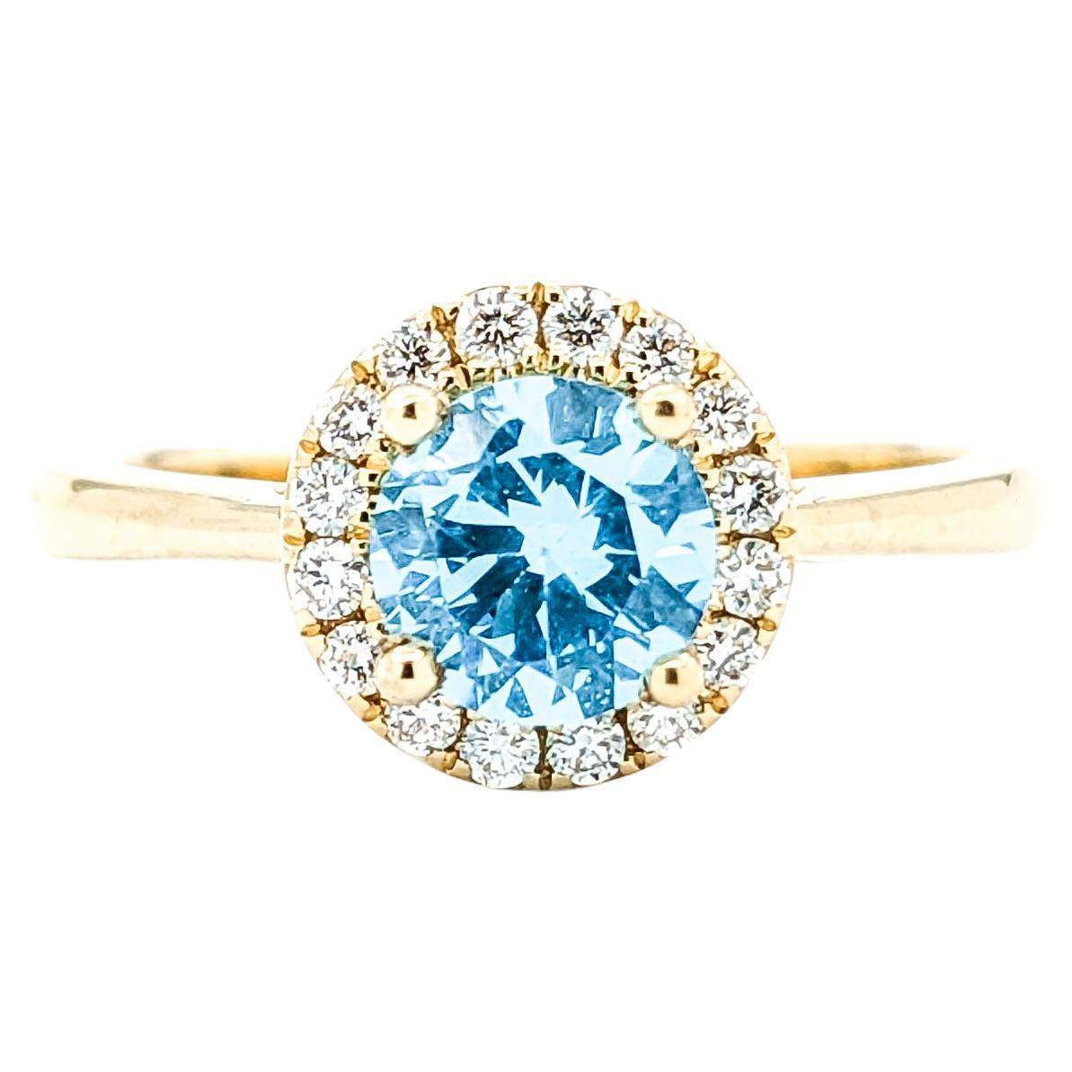 Anello con zircone blu e diamante da 1,40 carati in oro giallo