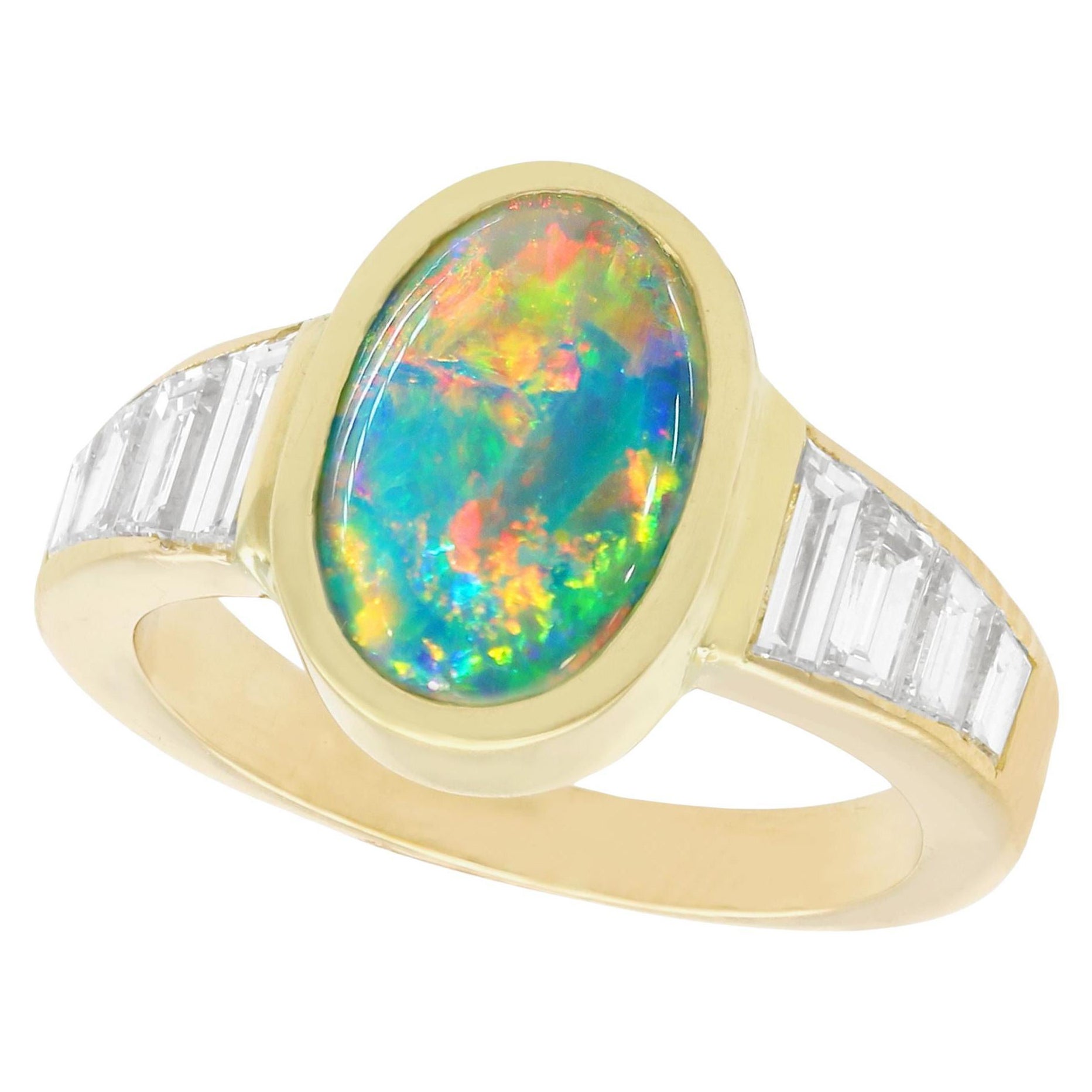 Bague cocktail en or jaune avec opale bleue cabochon de 1,40 carat et diamants de 1,12 carat en vente