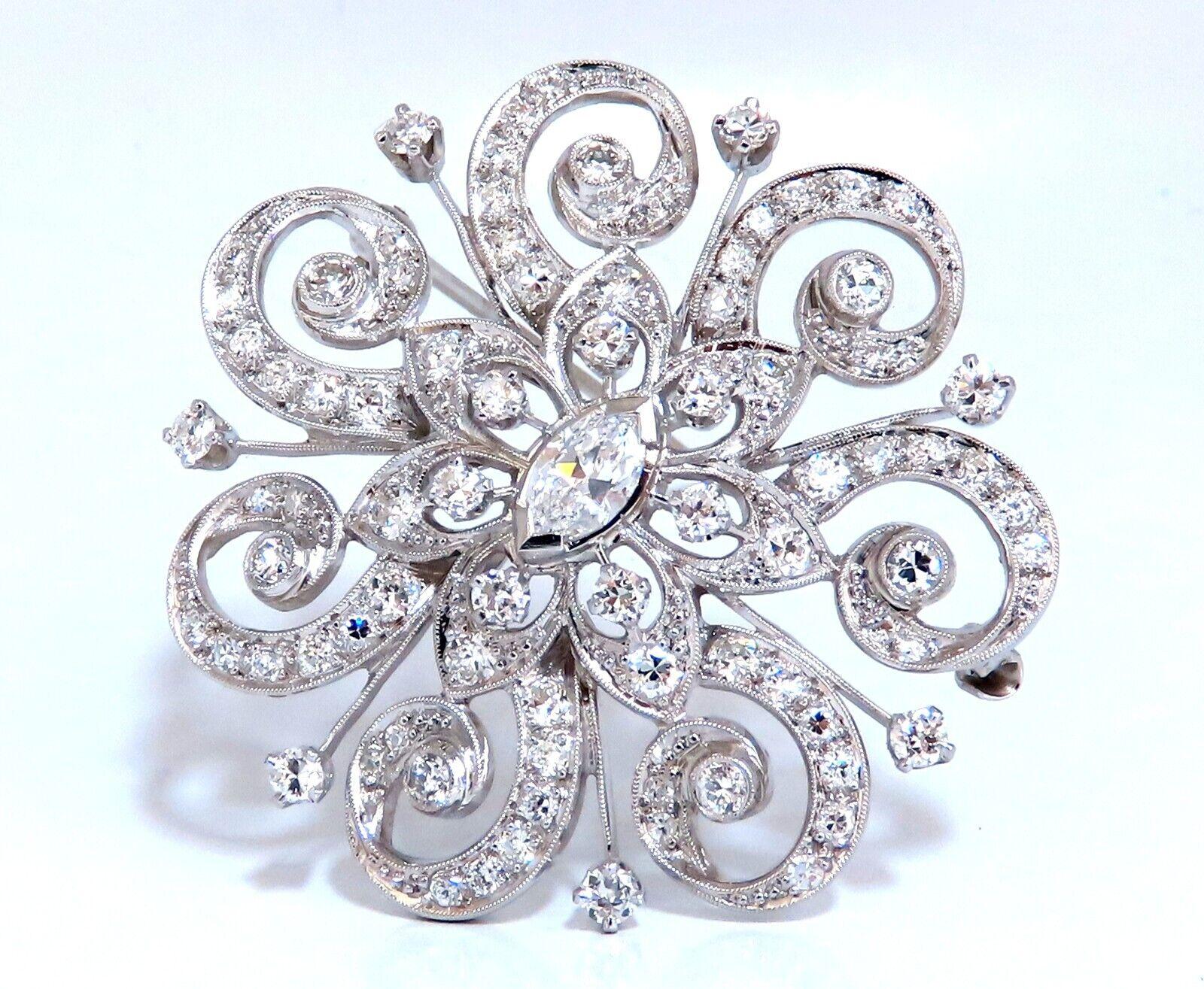 Vintage Platinum Brooch Pin

.50ct natural marquise 

&

1.40ct natural round diamonds

G-color Vs-2 Clarity

38mm diameter

Handmade 

Platinum 

18 Grams.

$21000 Appraisal to accompany