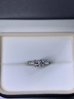 1.40ct Trilogy three diamonds cushion and round diamond engagement ring in plati