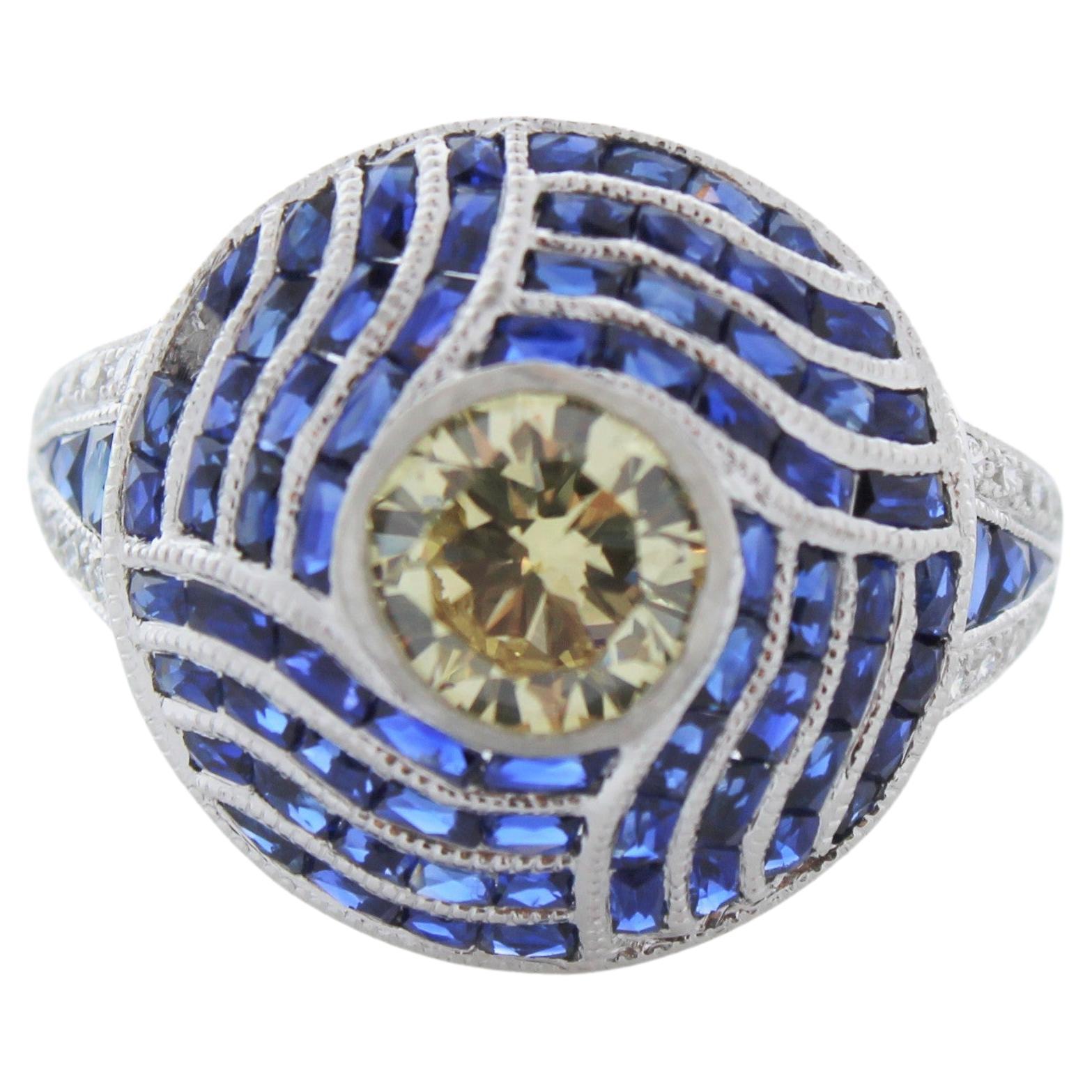 Bague en or blanc 14 carats avec saphir bleu de 1,40 carat et diamant de 1,20 carat