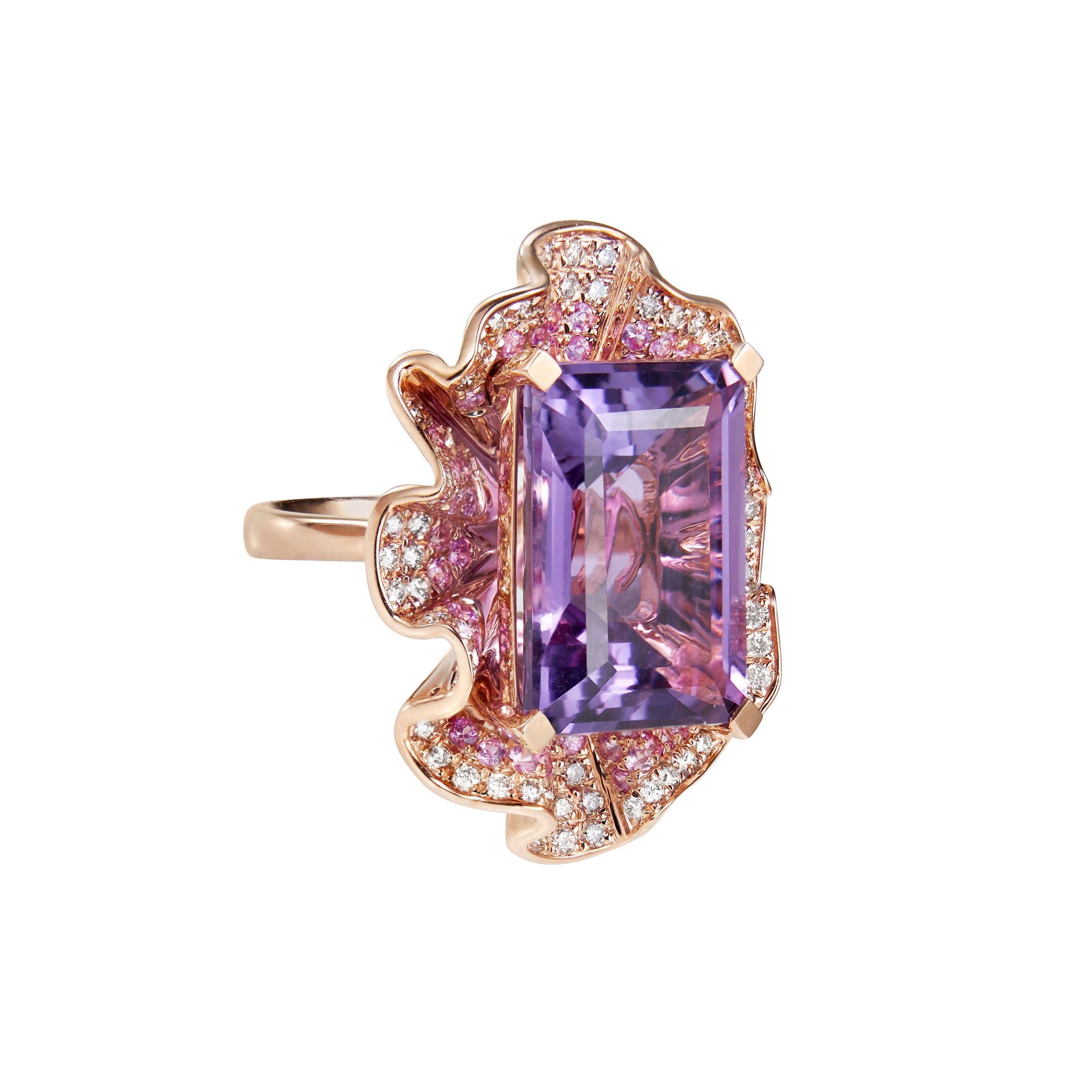 Sunita Nahata presents a collection of bold and colorful cocktail rings. This ring features a royal top shade purple amethyst at the center, with pink sapphires and diamonds radiating out onto the floral gold petals.  

Amethyst Cocktail Ring with