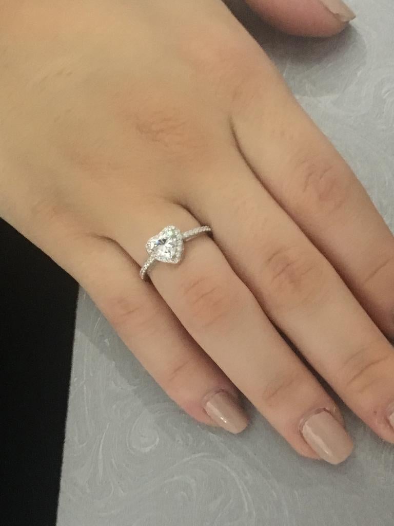 Inspired by the promise of love, this ring is sure to wow that special person in your life. 

Featuring a 1.41ct heart shape solitaire, surrounded by 0.40ct of round brilliant cuts, Composed of 925 sterling silver with a high gloss white rhodium