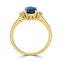 1.41 Carat Kyanite and 0.20 Carats Diamond Three Stone Ring