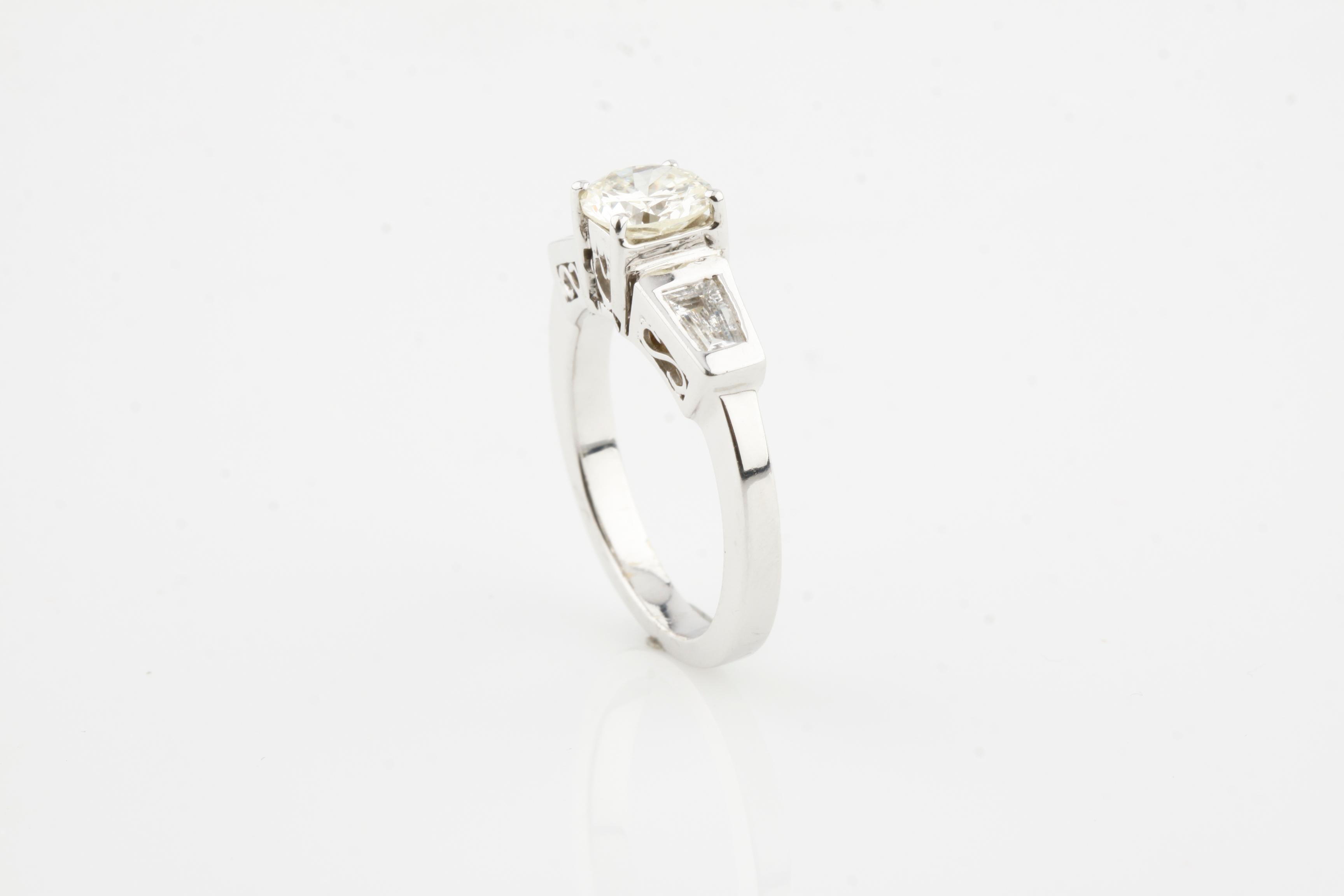 Round Cut 1.41 Carat Light Fancy Yellow Diamond 14 Karat White Gold Engagement Ring For Sale