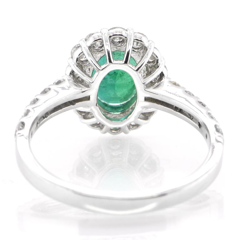 Women's 1.41 Carat Natural Emerald and Diamond Halo Ring Set in Platinum For Sale