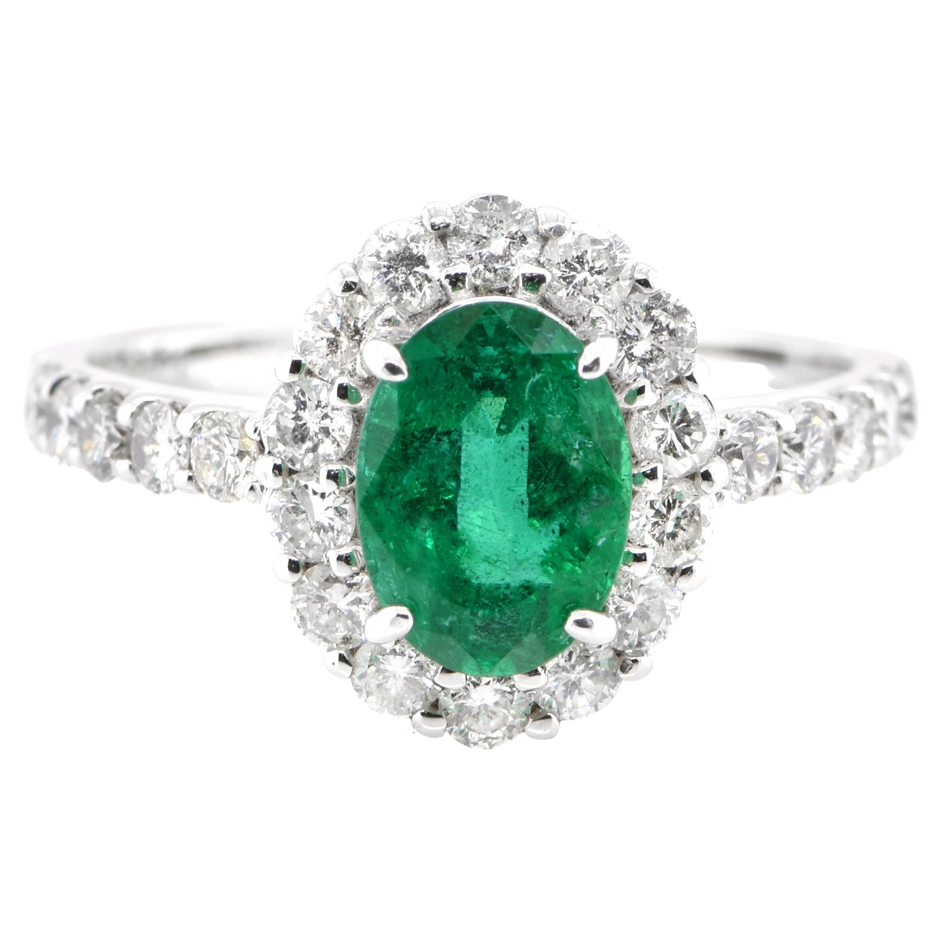1.41 Carat Natural Emerald and Diamond Halo Ring Set in Platinum