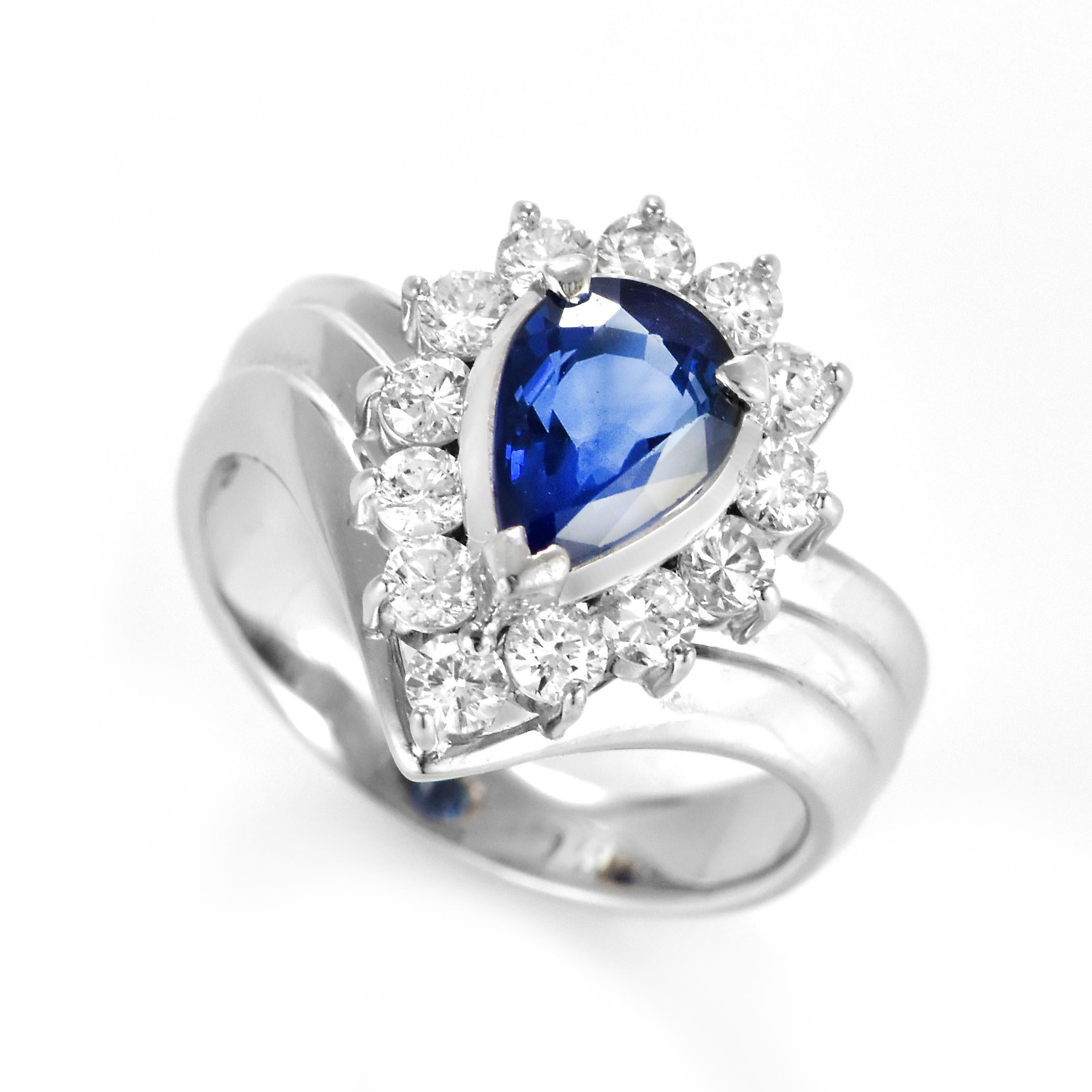 A beautiful ring featuring a 1.41  Carat Natural Sapphire and 0.65 Carats Diamond Accents set in Platinum. Sapphires have extraordinary durability - they excel in hardness as well as toughness and durability making them very popular in jewelry.