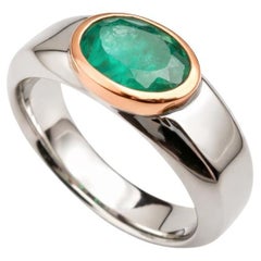 1.41 Carat Oval Emerald in White - and Rose Gold Men's Ring by Alexander Leyser