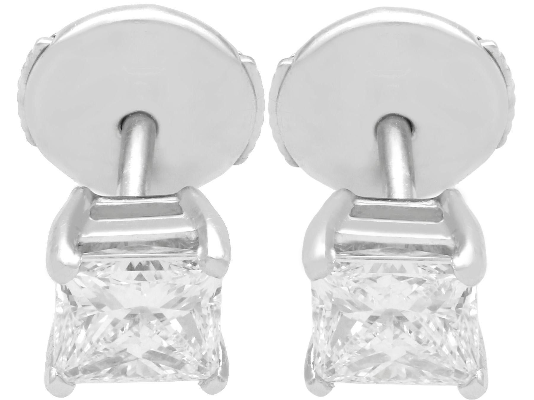 An impressive pair of contemporary 1.41 carat diamond and platinum stud earrings; part of our diverse diamond jewelry and estate jewelry collections.

These fine and impressive princess cut diamond earrings have been crafted in platinum.

The