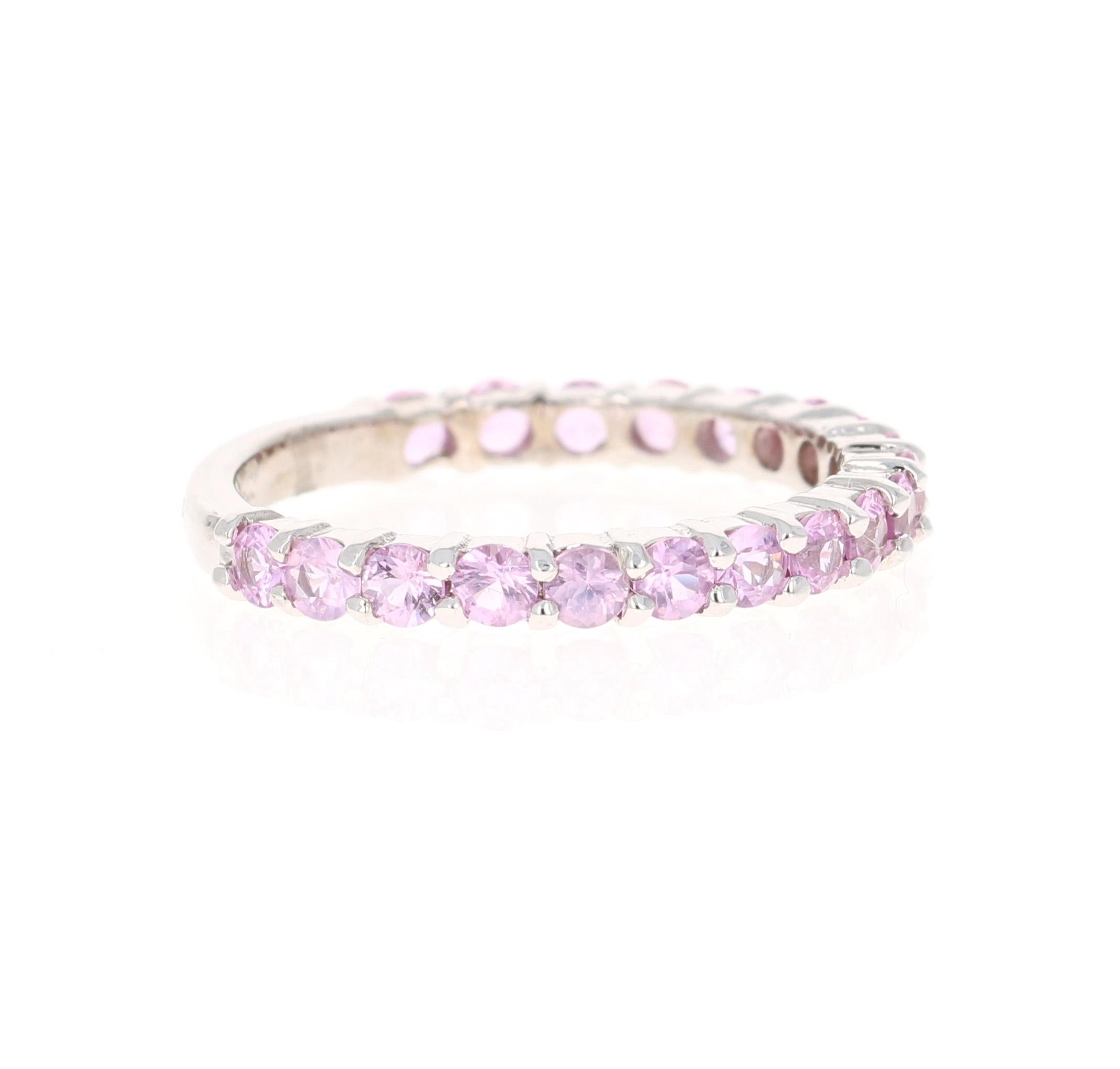 This ring has 19 Pink Sapphires that weigh 1.41 Carats. 

Crafted in 14 Karat White Gold and weighs approximately 2.1 grams 

The ring is a size 7 and can be re-sized at no additional charge!