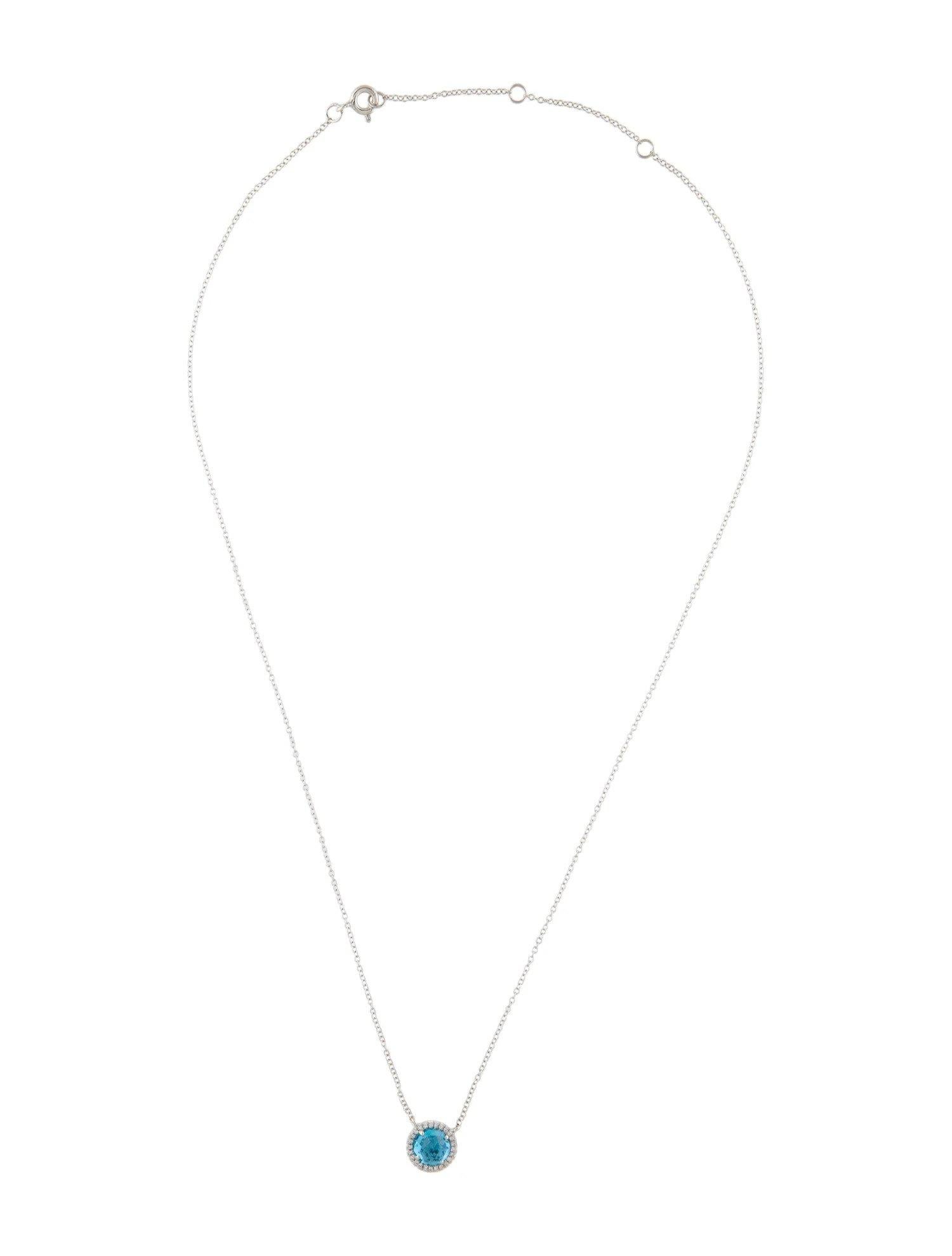 Collar colgante de oro blanco con topacio azul suizo redondo de 1,41 quilates y diamantes en Nuevo estado para la venta en Great Neck, NY