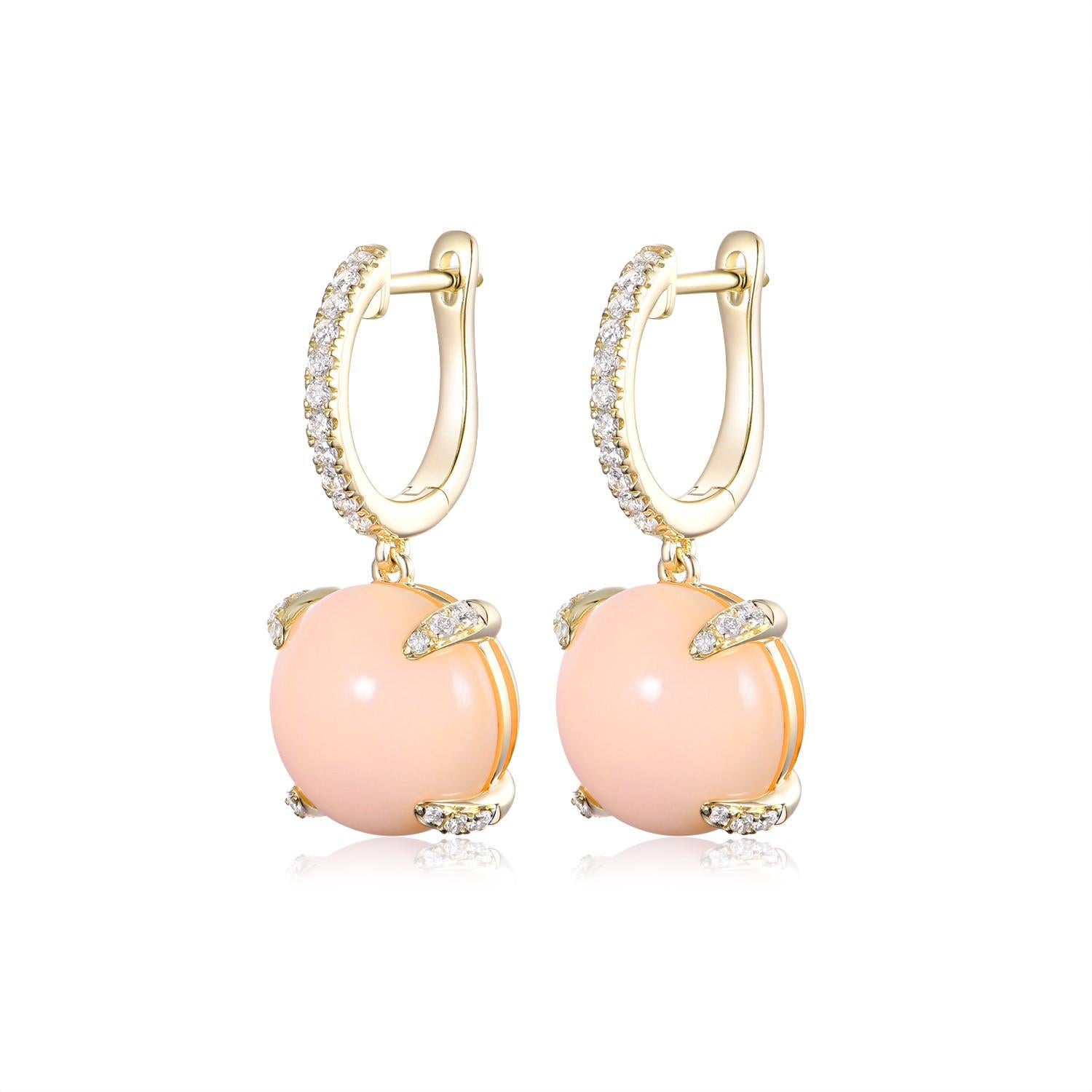 Indulge in the sublime elegance of these Angel Skin Coral and Diamond Earrings, a luxurious addition to any fine jewelry collection. Each earring features a sumptuous 14.10-carat Angel Skin Coral, celebrated for its delicate peach-pink hue that