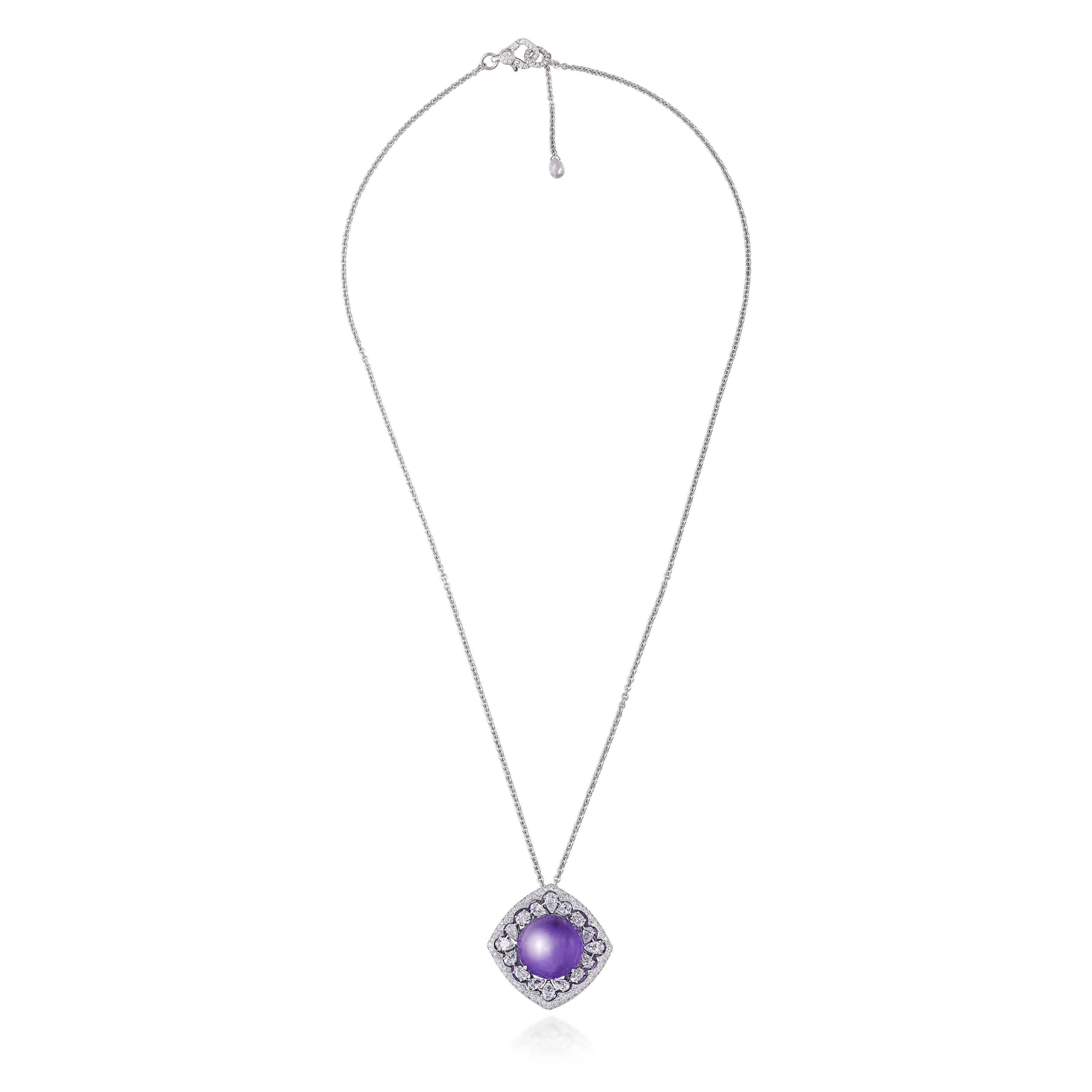 The Amethyst Eye is ensemble of different types of diamonds from Rarever. The pendant has a purplish hued amethyst cabochon weighing 14.12 carats, which is surrounded by pear shaped Rose cut Diamonds  set in a way making a geometric form. The round