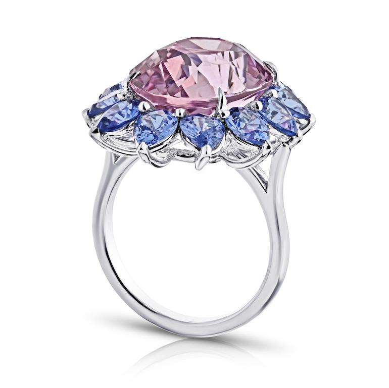14.15 carat Oval Pink Natural No Heat Sapphire surrounded by twelve pear shape sapphires 4.50 carats set in a handmade platinum ring