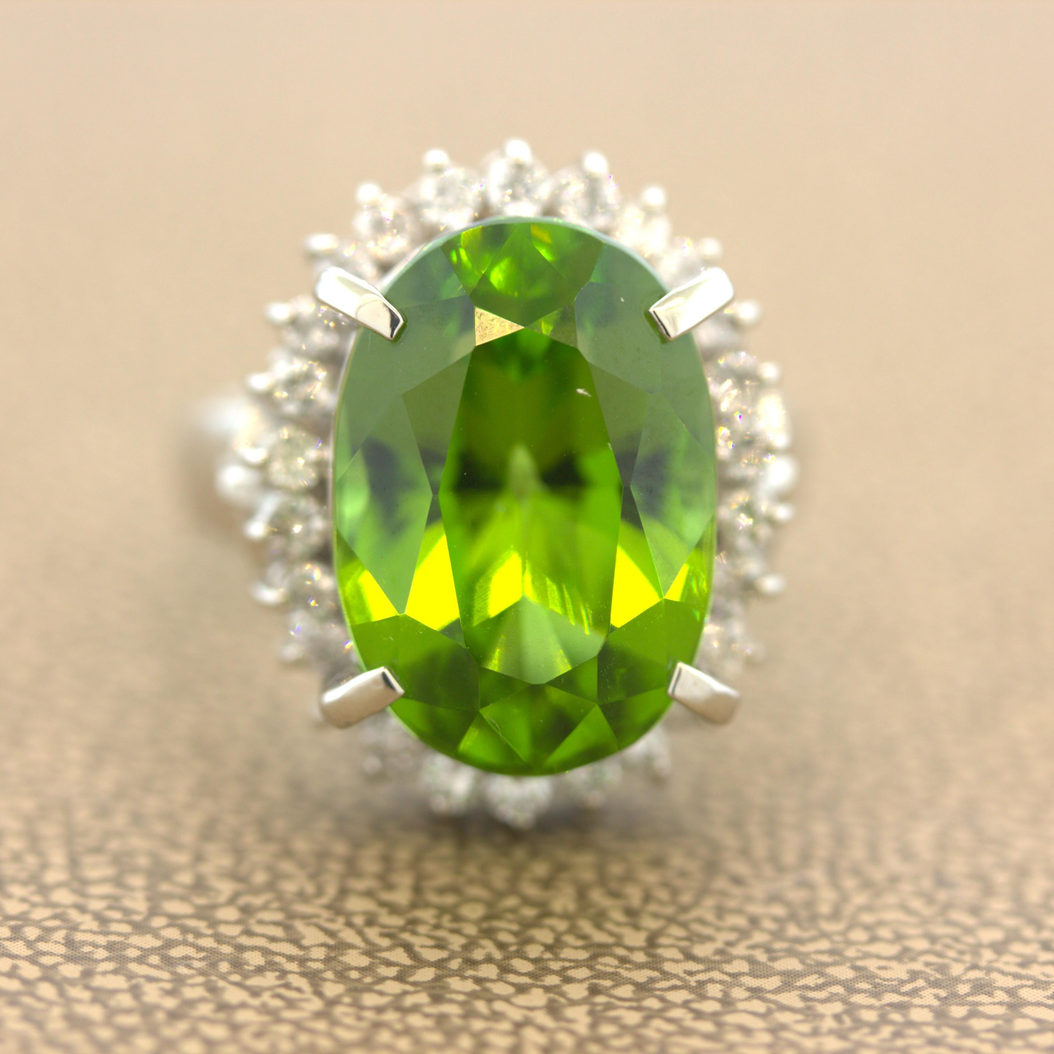A simple yet elegant platinum ring featuring a fine gem quality peridot with excellent color and clarity. The peridot weighs 14.19 carats and has a super bright and rich green color. Adding to that, the stone is completely eye clean with no visible