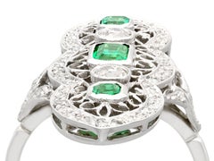Antique 1.41 Carat Emerald Cut Diamond and Emerald Gold Marquise Ring