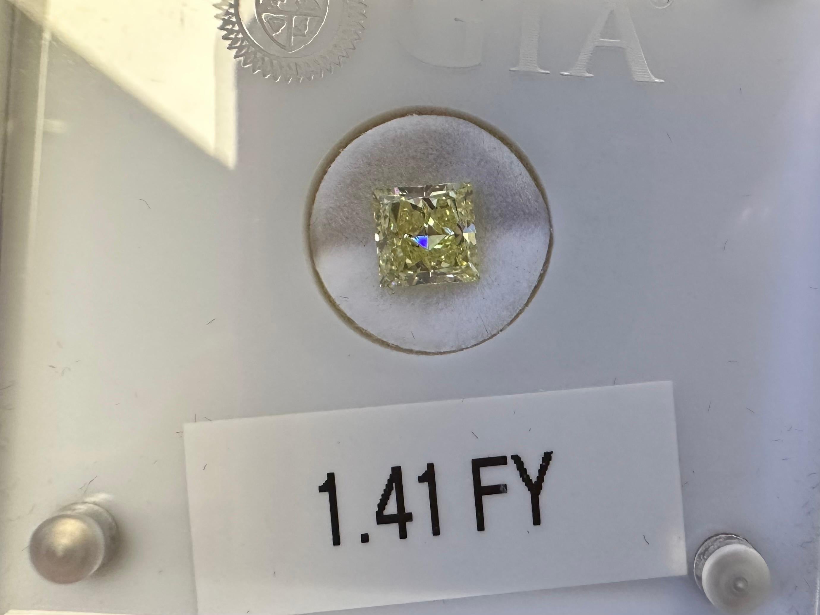 GIA certified diamond, beautiful fancy yellow, comes with box and papers!

Natural Color Diamond:
Color: Fancy Yellow
Cut: Square Brilliant
Carat: 1.41ct

Certificate of authenticity comes with purchase

ABOUT US
We are a family-owned business. Our