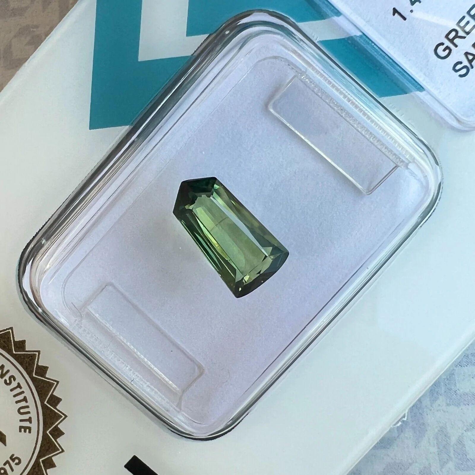 1.41ct Unique IGI Blue Yellow Green Sapphire Untreated Fancy Pentagon Cut Gem

Unique Untreated Bluish Yellowish Green Sapphire In IGI Blister.
1.41 Carat with an excellent fancy pentagon cut and totally untreated/unheated which is very rare for