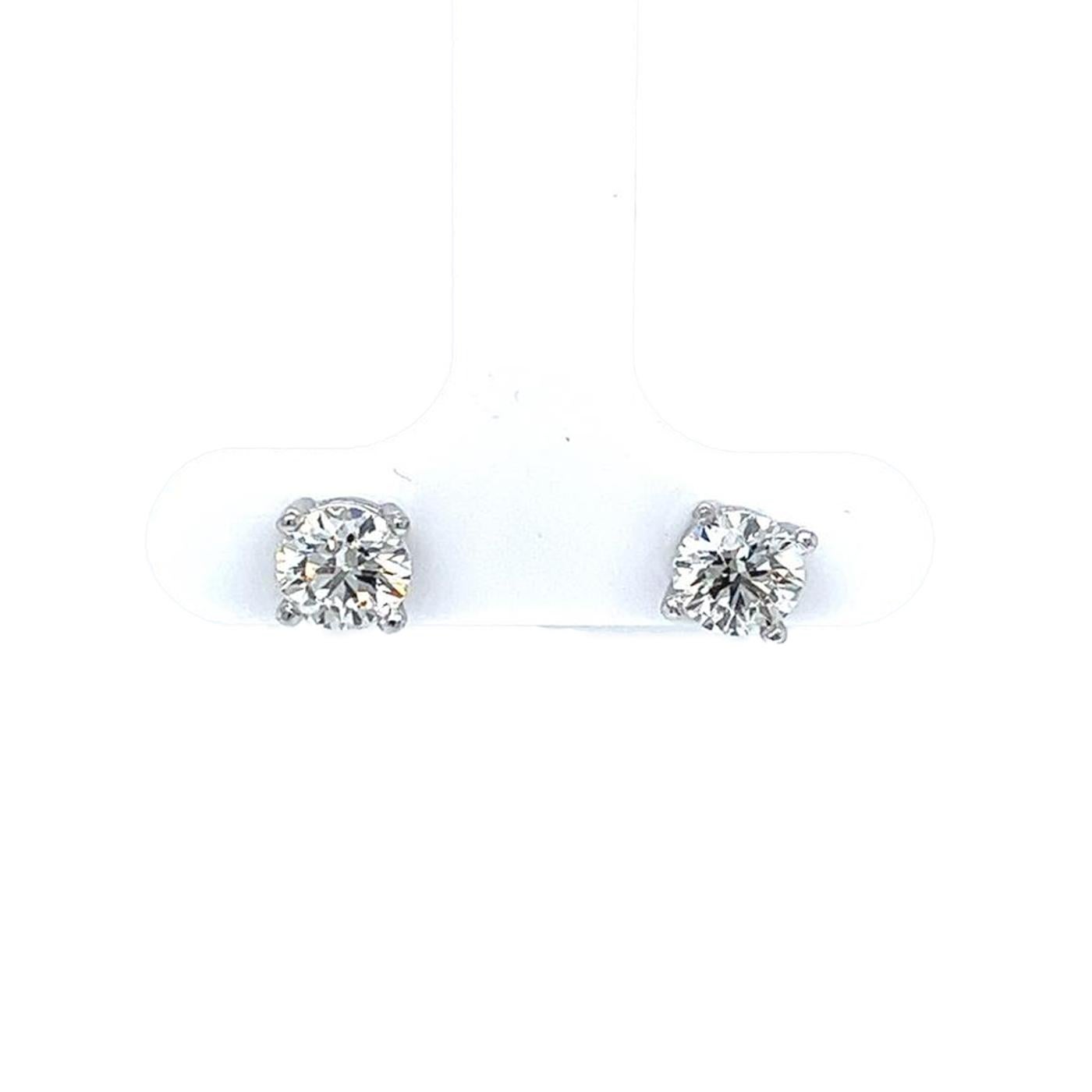 The 1.41ctw Diamond earrings in 4 Prong catch the light perfectly, making them dance with scintillating brilliance. The Diamond Earrings are feminine and delicate, offering a refined and elegant design, Day or night, adding sparkle and elegance to