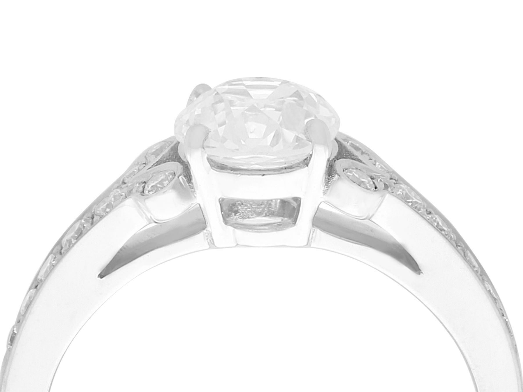 A stunning, fine and impressive antique 1.42 carat diamond (total) and contemporary 18k white gold ring; part of our diverse diamond jewelry and estate jewelry collections.

his stunning diamond solitaire ring has been crafted in 18k white