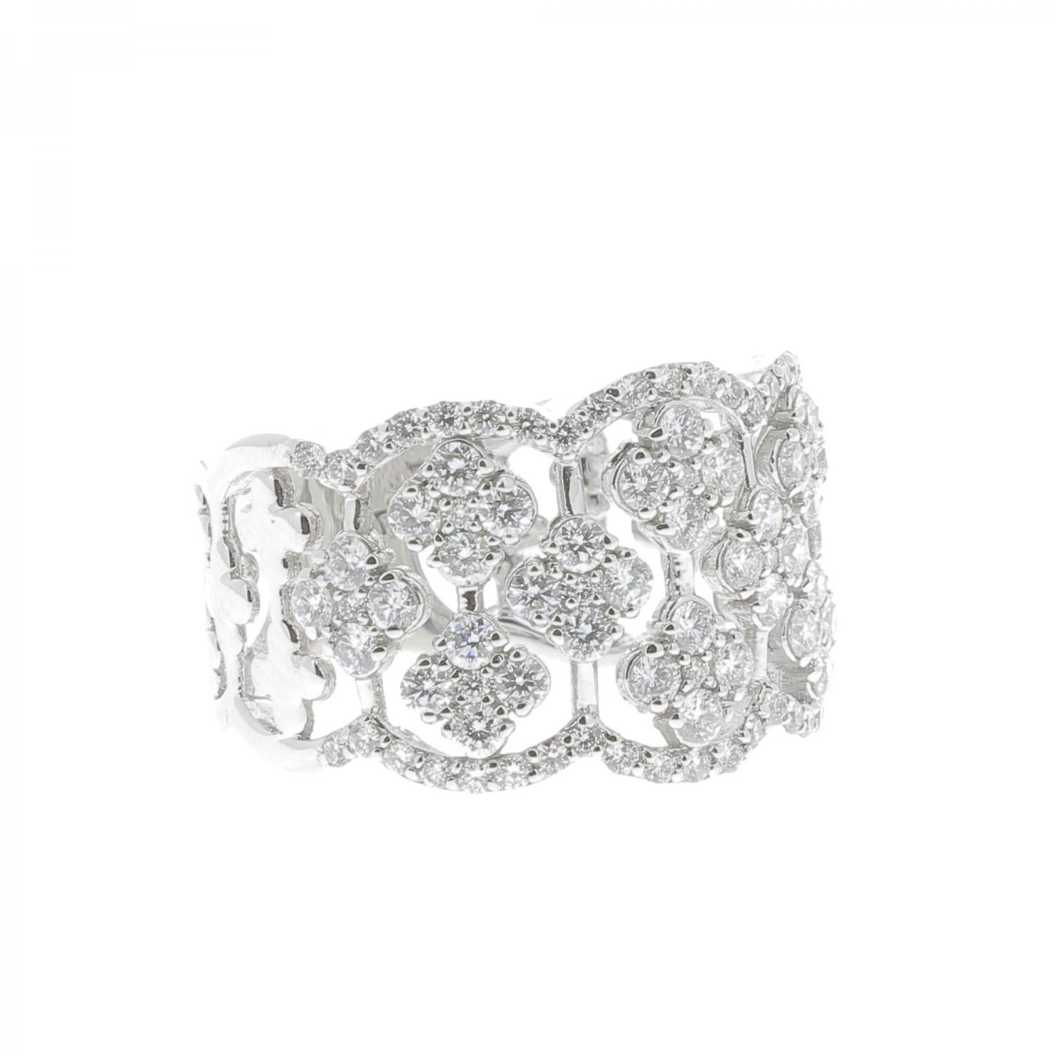 The Clover Ring is a unique and trendy ring set with 1.42 carat.
The ring is paved with clover set with brilliants cut diamonds.
The Ring is in 18K White Gold.
The Diamonds are GVS quality.
The ring size is 6 ½ US and can be size.
