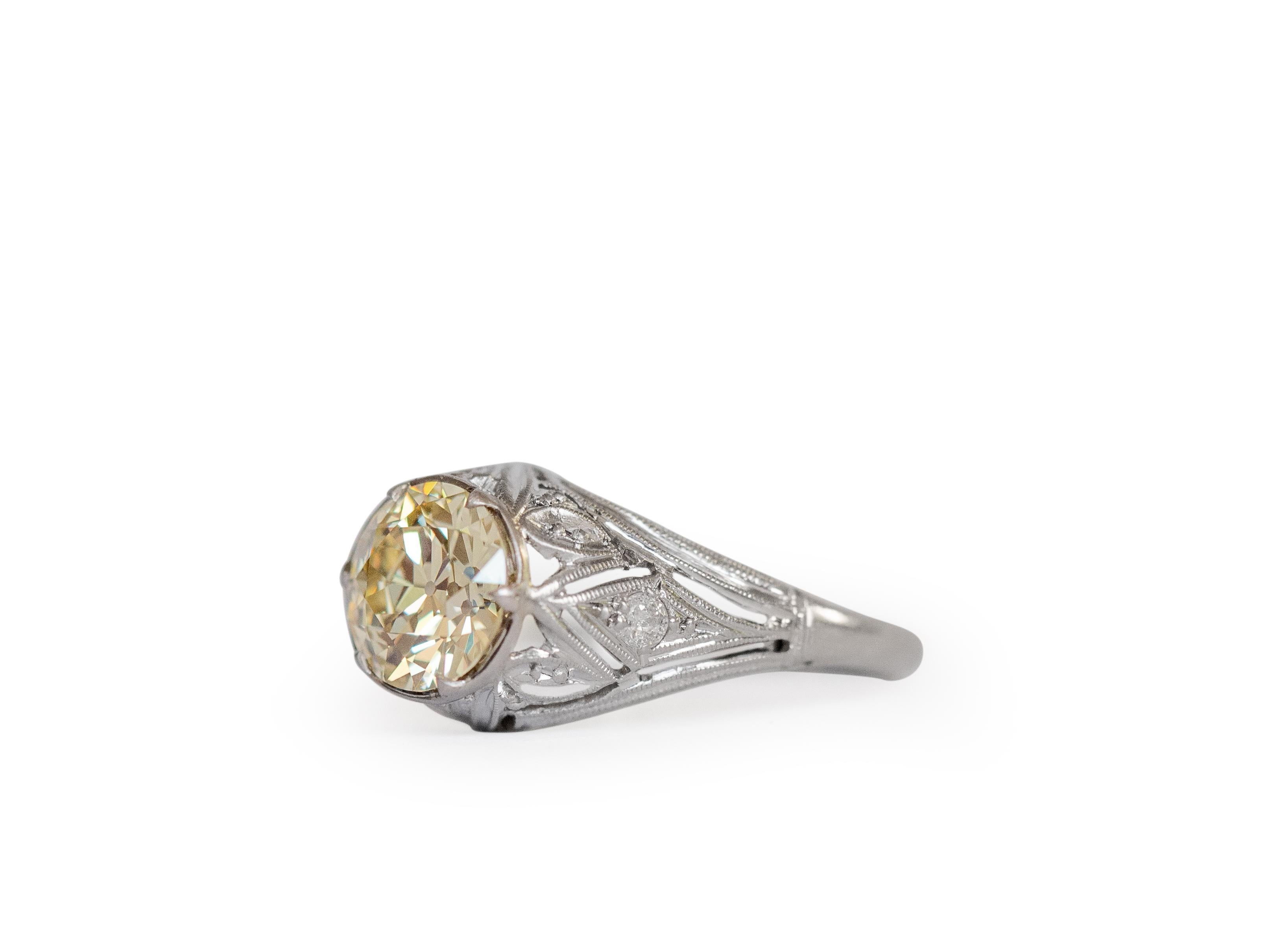 Ring Size: 5
Metal Type: Platinum  [Hallmarked, and Tested]
Weight:  3 grams

Center Diamond Details:

Weight: 1.42 carat
Cut: Old European Brilliant
Color: OP (Light Yellow)
Clarity: VS2

Finger to Top of Stone Measurement: 5.5mm
Condition: 