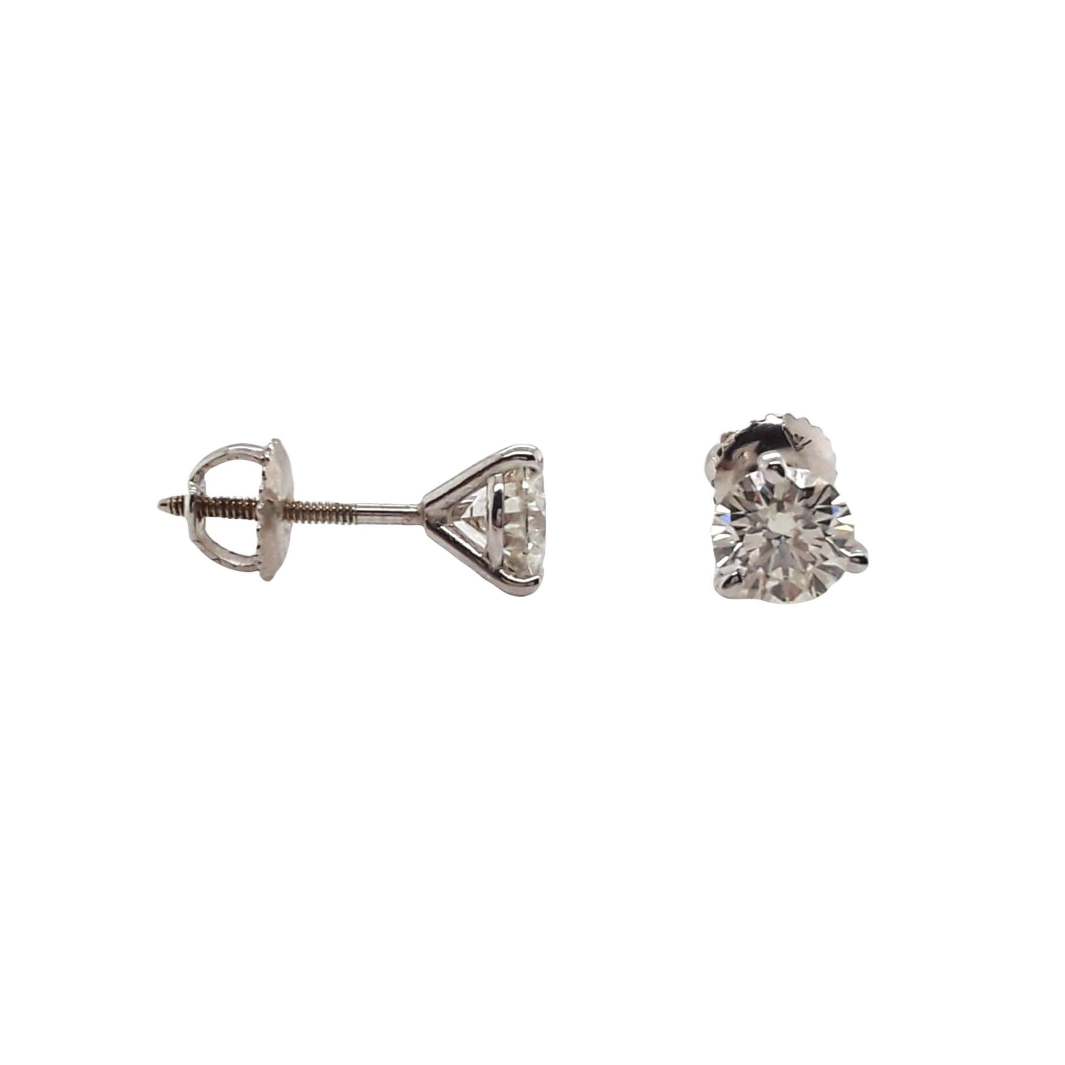 Diamond Stud Earrings made with natural brilliant cut diamonds. Total Weight: 1.42 carats, Stone Diameter: 5.75 x 5.79. Set on a 4 prong mounting in 18 karat white gold, screw back setting. 