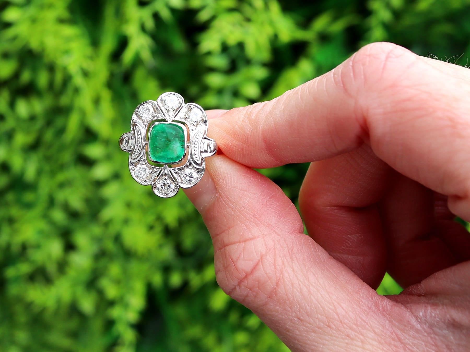 A stunning, fine and impressive antique 1.42 carat emerald and 0.85 carat diamond, 18 karat yellow gold and 14 karat white gold set dress ring; part of our diverse emerald jewelry collections.

This stunning, fine and impressive emerald ring has