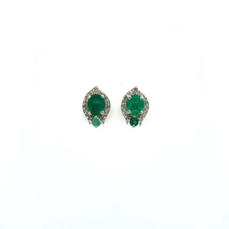 1.42 Carat Emerald Diamond Stud Earrings in sterling silver to make a statement with your look. You shall need stud earrings to make a statement with your look. These earrings create a sparkling, luxurious look featuring oval, round cut natural
