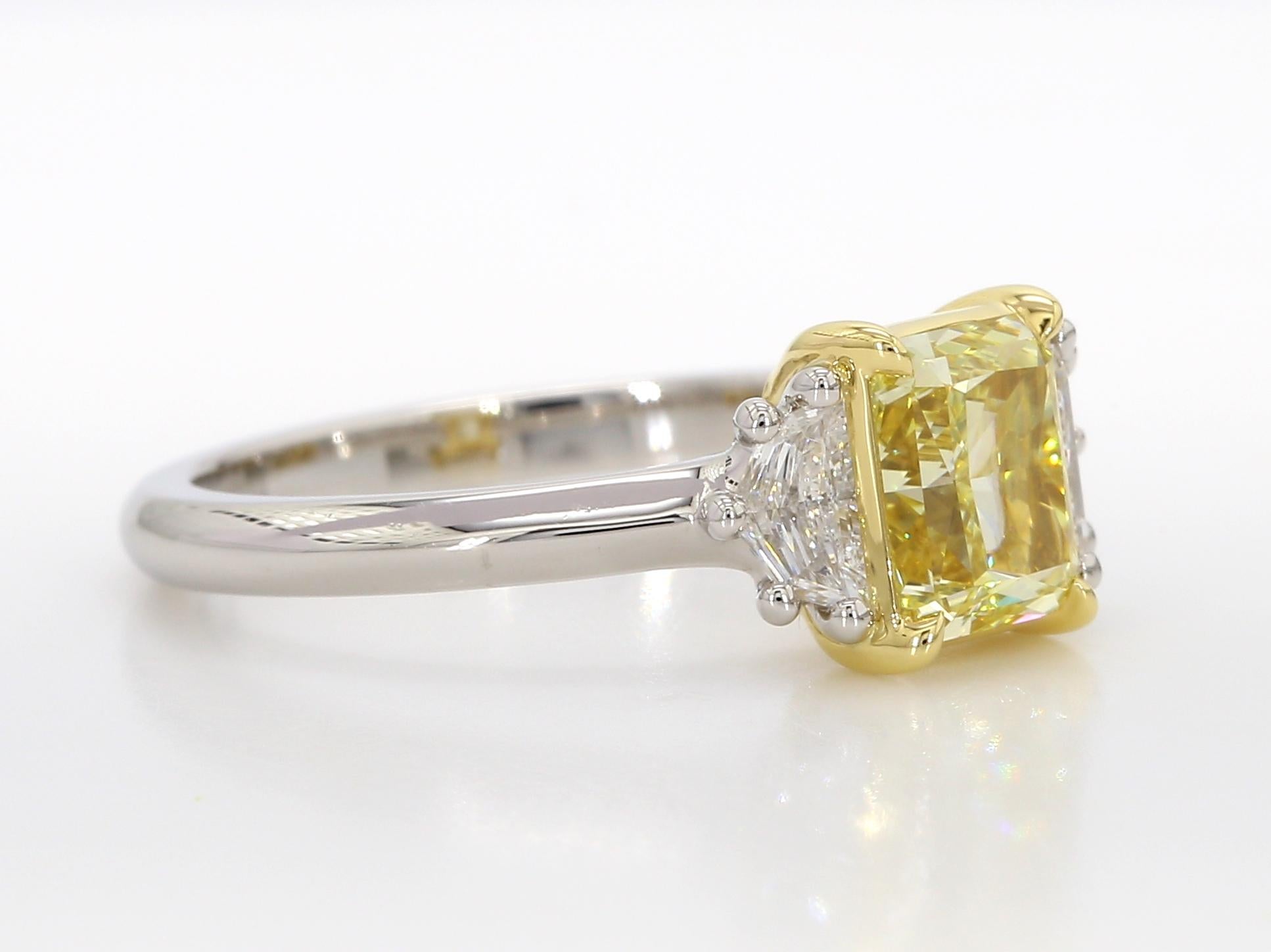 Contemporary 1.42 Carat Fancy Yellow Diamond Three-Stone Engagement Ring, GIA, IF, Platinum. For Sale