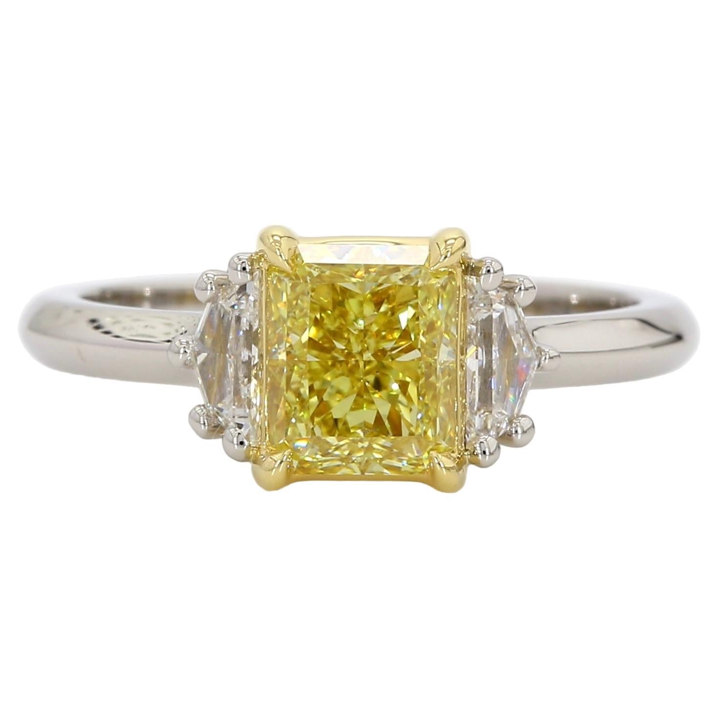 1.42 Carat Fancy Yellow Diamond Three-Stone Engagement Ring, GIA, IF, Platinum.