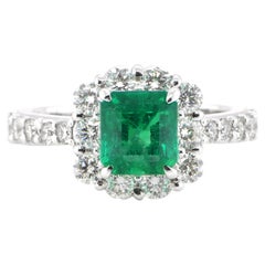 1.42 Carat Natural Vivid Green Emerald and Diamond Ring set in Platinum