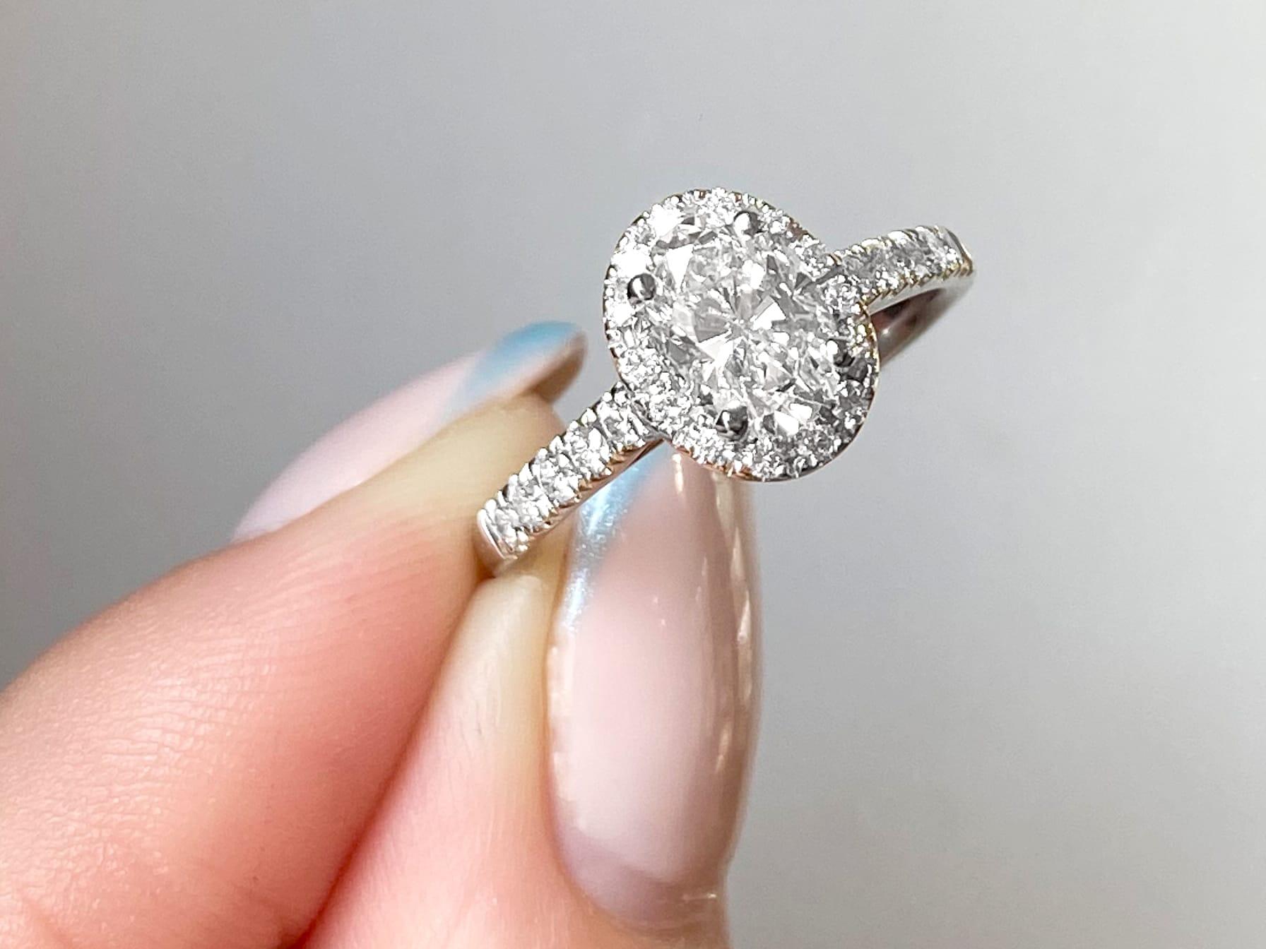 Contemporary 1.42 Carat Oval Cut Diamond and White Gold Engagement Ring For Sale