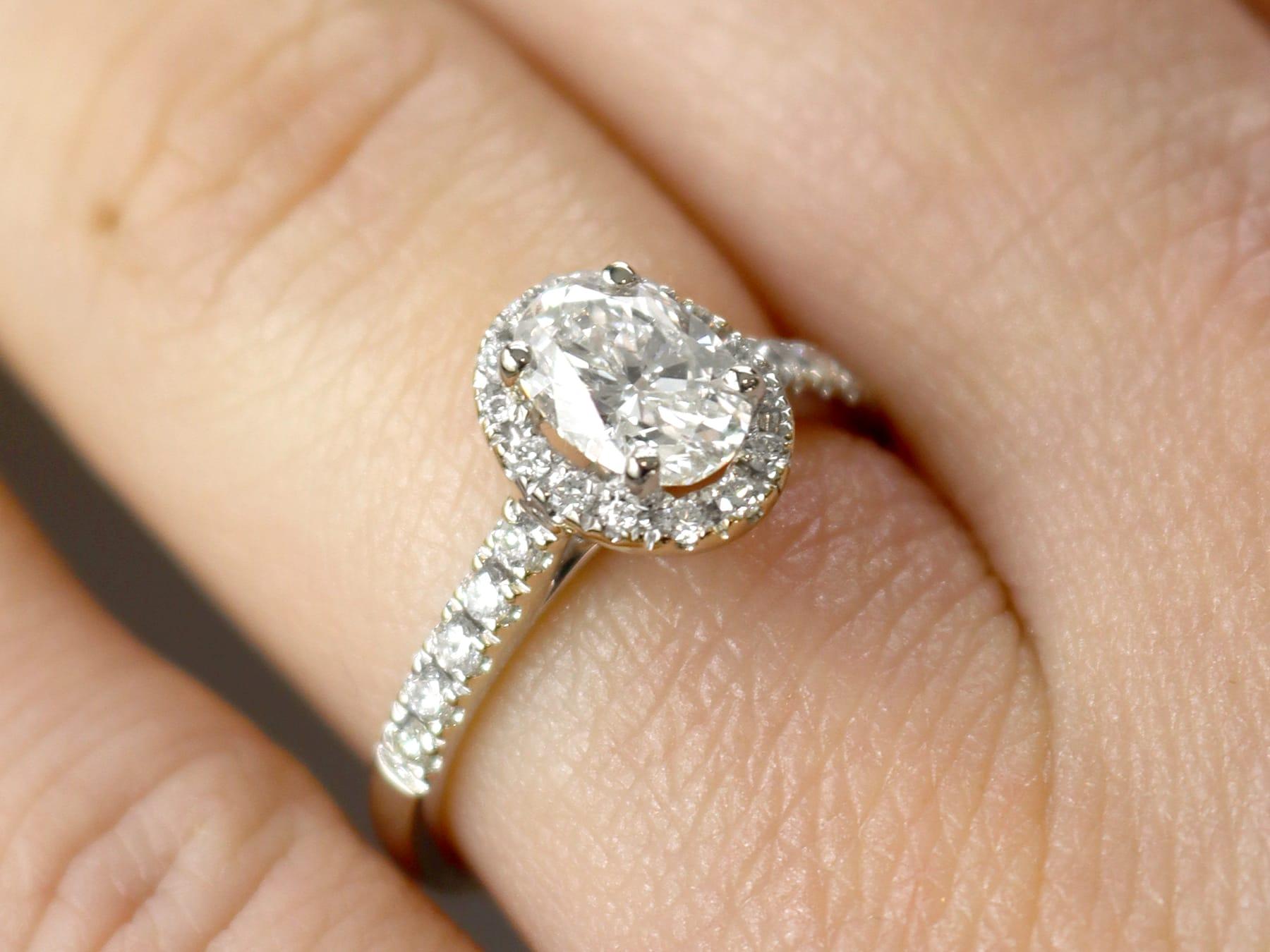 Women's 1.42 Carat Oval Cut Diamond and White Gold Engagement Ring For Sale