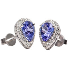 1.42 Carat Pear Shaped Tanzanite 0.30 Carat White Diamond 18 Karat Gold Earrings