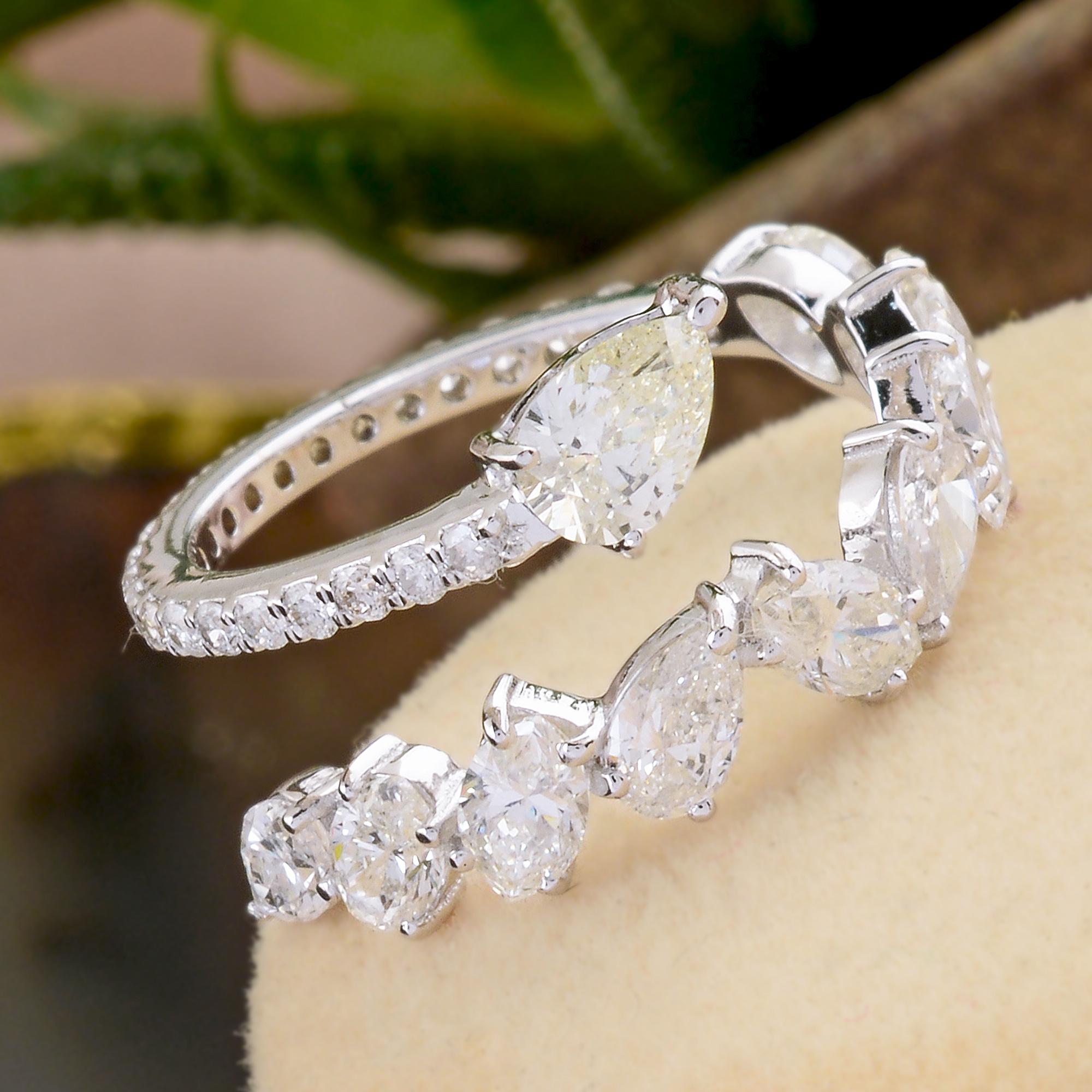 Modern 1.42 Carat SI/HI Pear Emerald Cut Diamond Criss Cross Ring 18 Karat White Gold For Sale