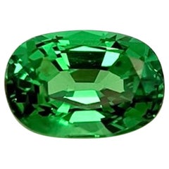 Bague ou pendentif à trois pierres non sertis en grenat tsavorite ovale de 1,42 carat