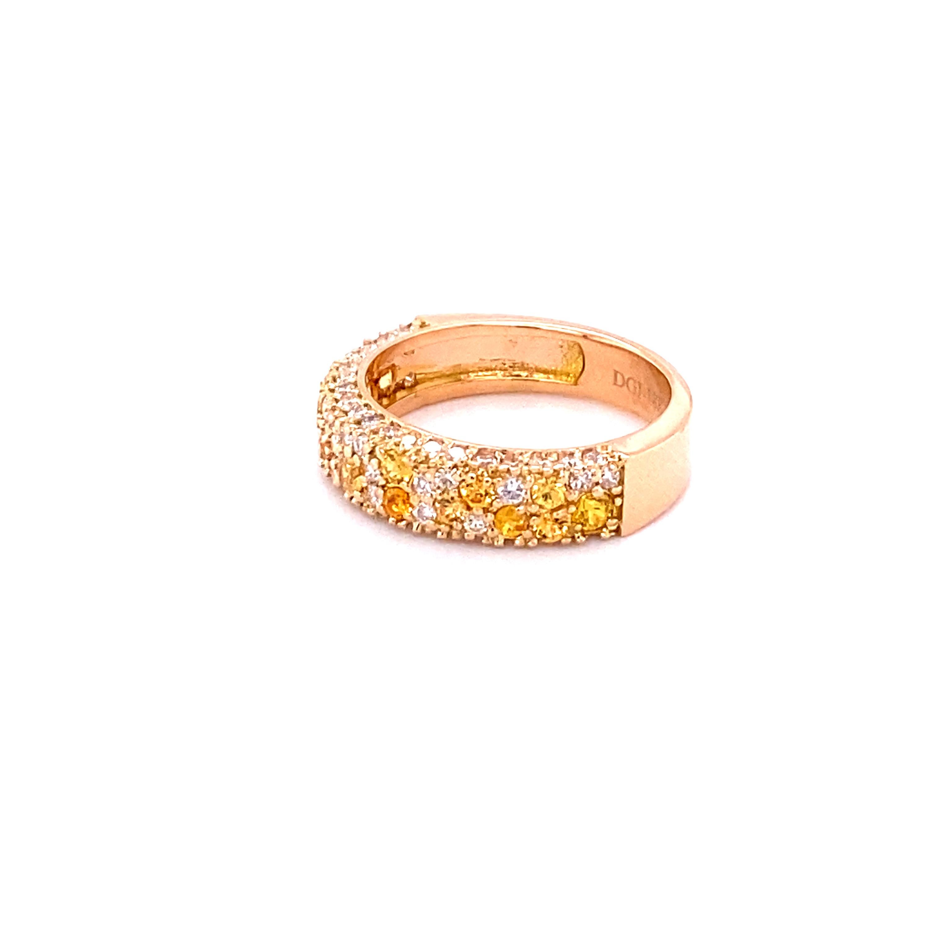 This Yellow Sapphire and White Diamond Band is stunning and versatile! Can be worn as a wedding or engagement band or as a gorgeous cocktail ring or an everyday stunner! 

There are 59 Round Cut Diamonds that weigh 0.75 Carats and 16 Round Cut