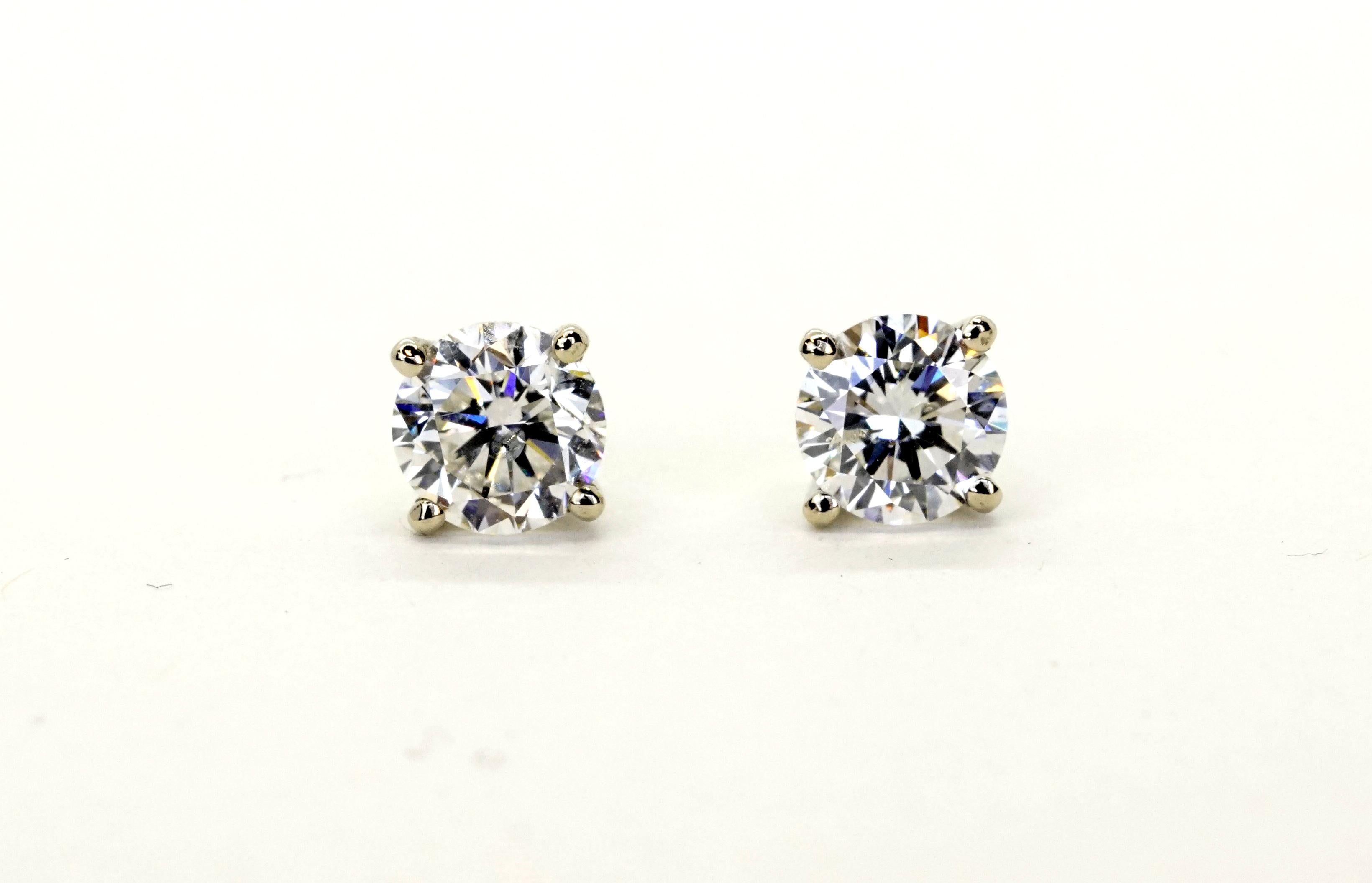 Contemporary 1.42 Carats Total Diamond Stud Earrings For Sale