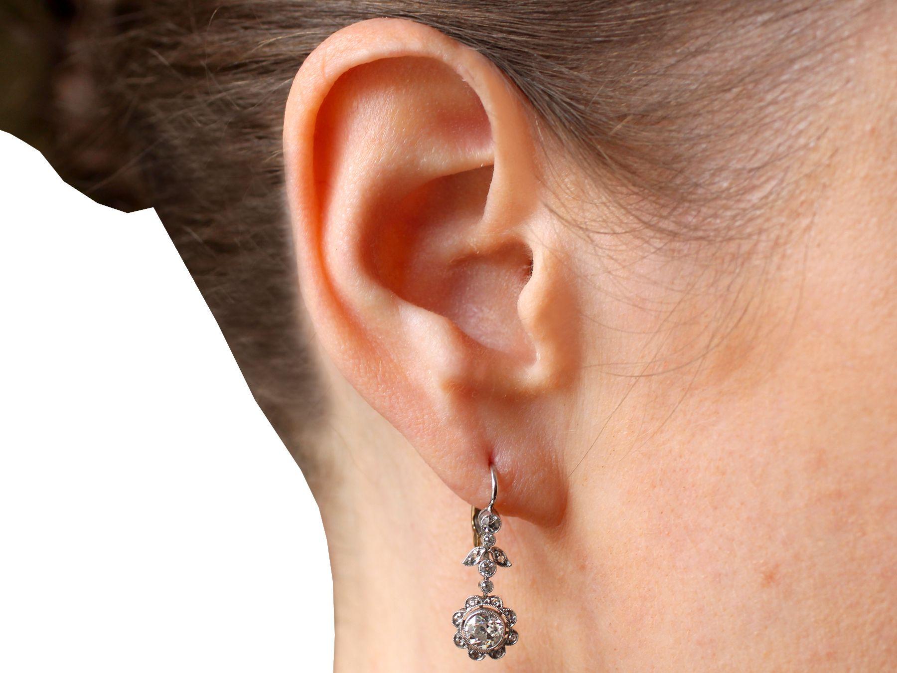 Antique 1.42 Carat Diamond and Platinum Floral Drop Earrings For Sale 4
