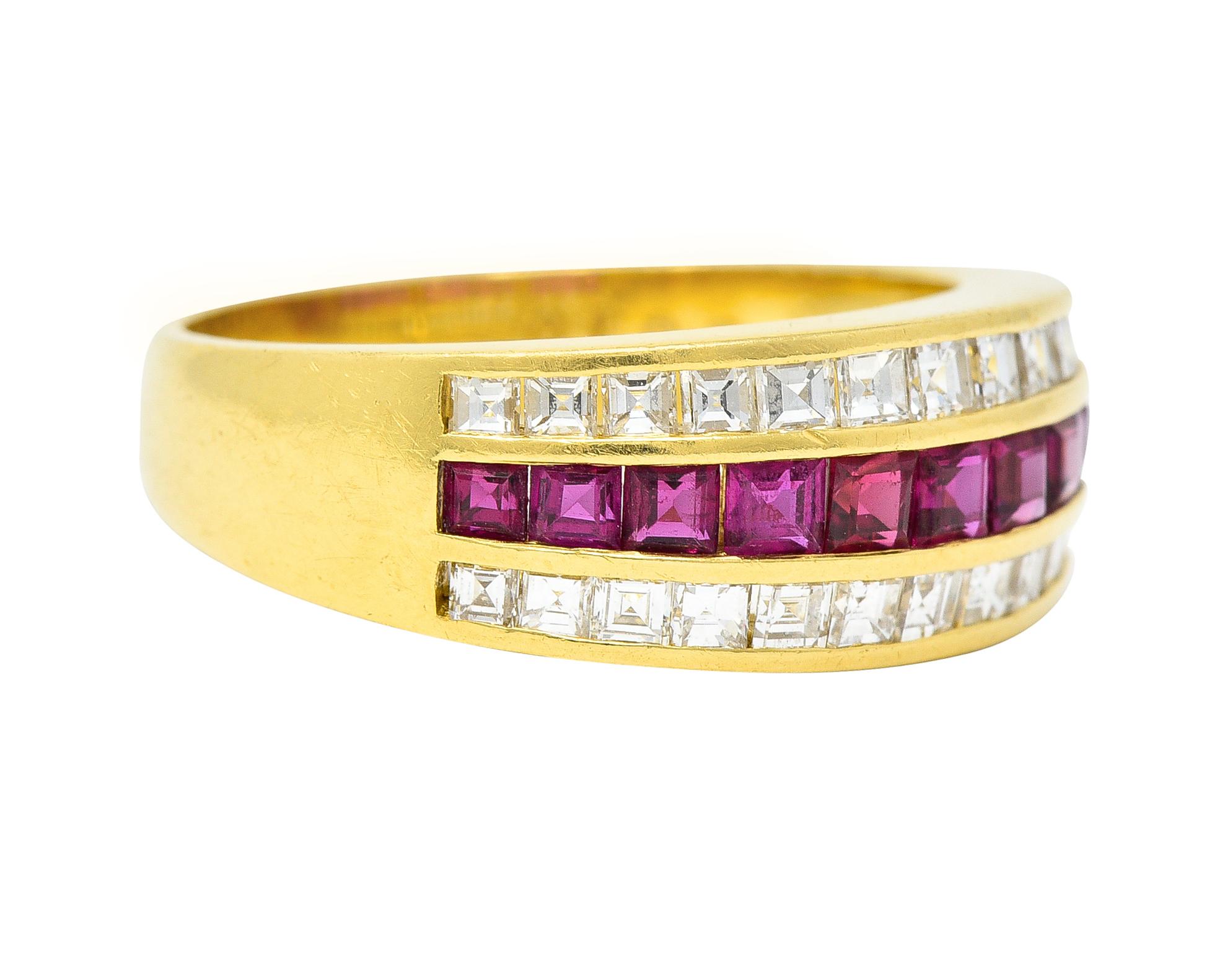 Designed as three stacked rows of alternating channel set square step-cut diamonds and rubies 
Diamonds weigh 0.70 carat total - G/H with VS clarity
Rubies weigh 0.72 carat total - transparent medium purplish-red in color 
Completed by high polish
