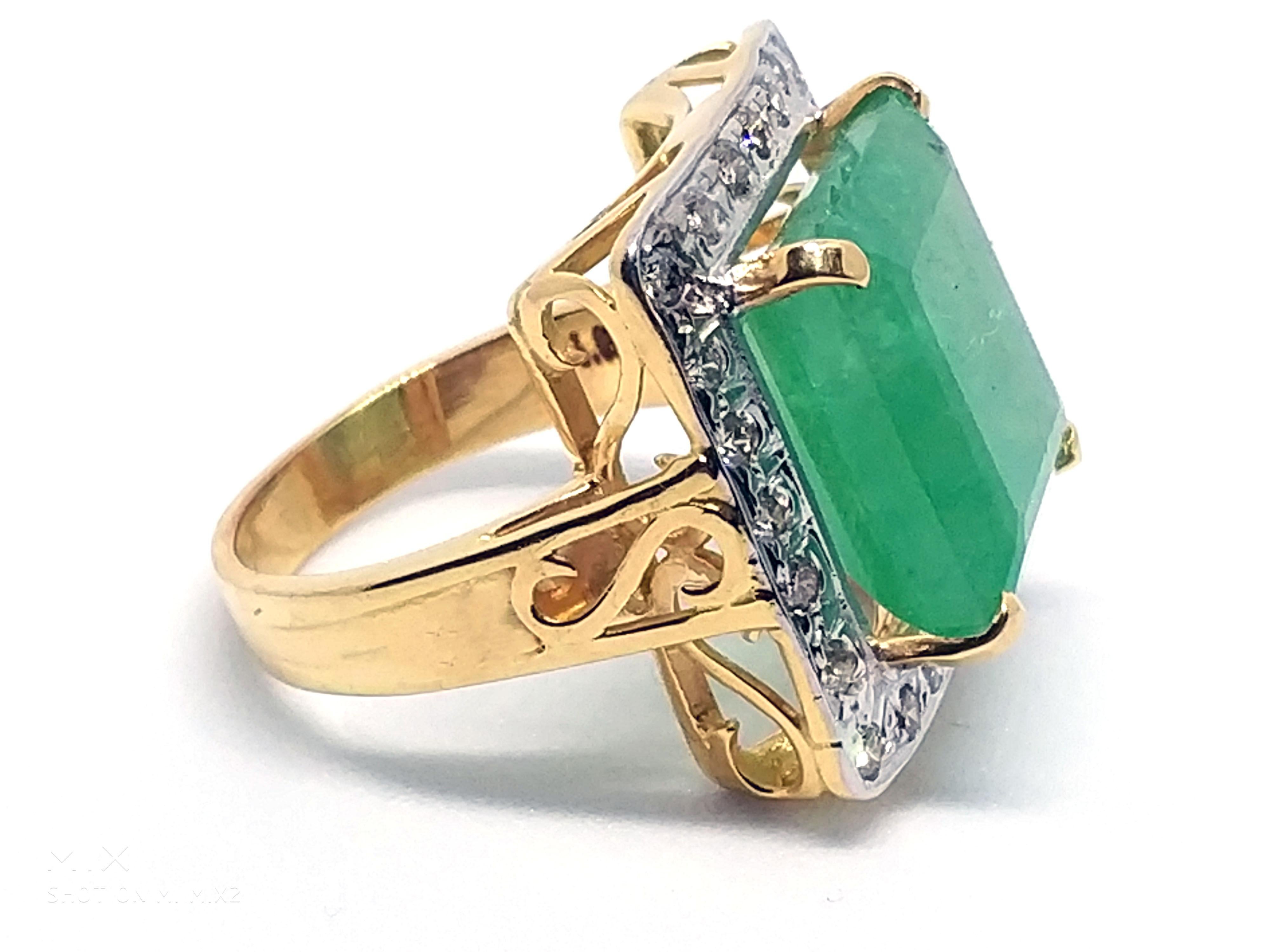 13.21 carat certified emerald and
1 carat diamond
in 18 carat yellow gold