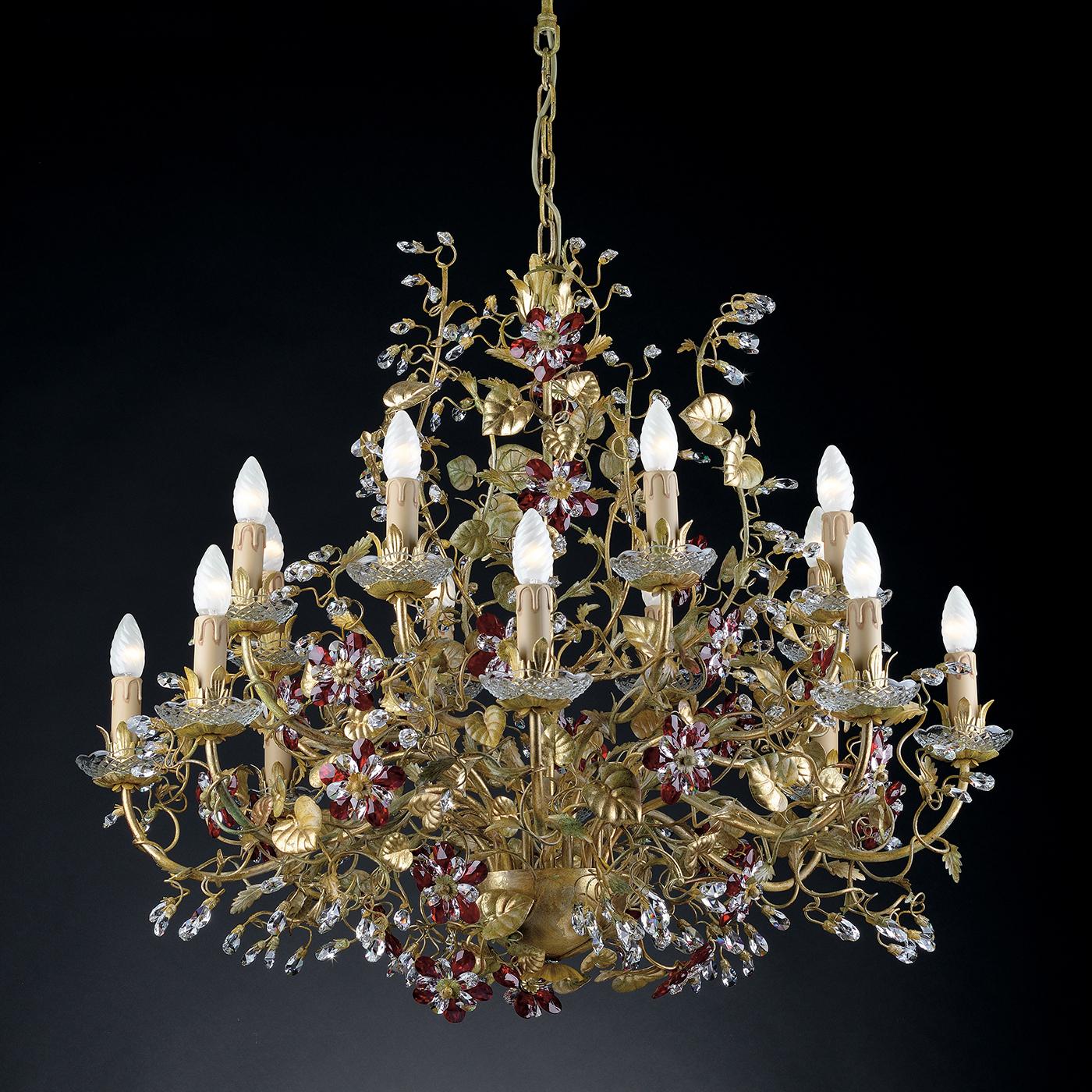 Exuding extravagant natural energy, this chandelier features two tiers of lighting, each with eight arms. Inspired by wildflowers, the chandelier's frame is painted green and accented with gold leaf while the flowers are made fro transparent and red