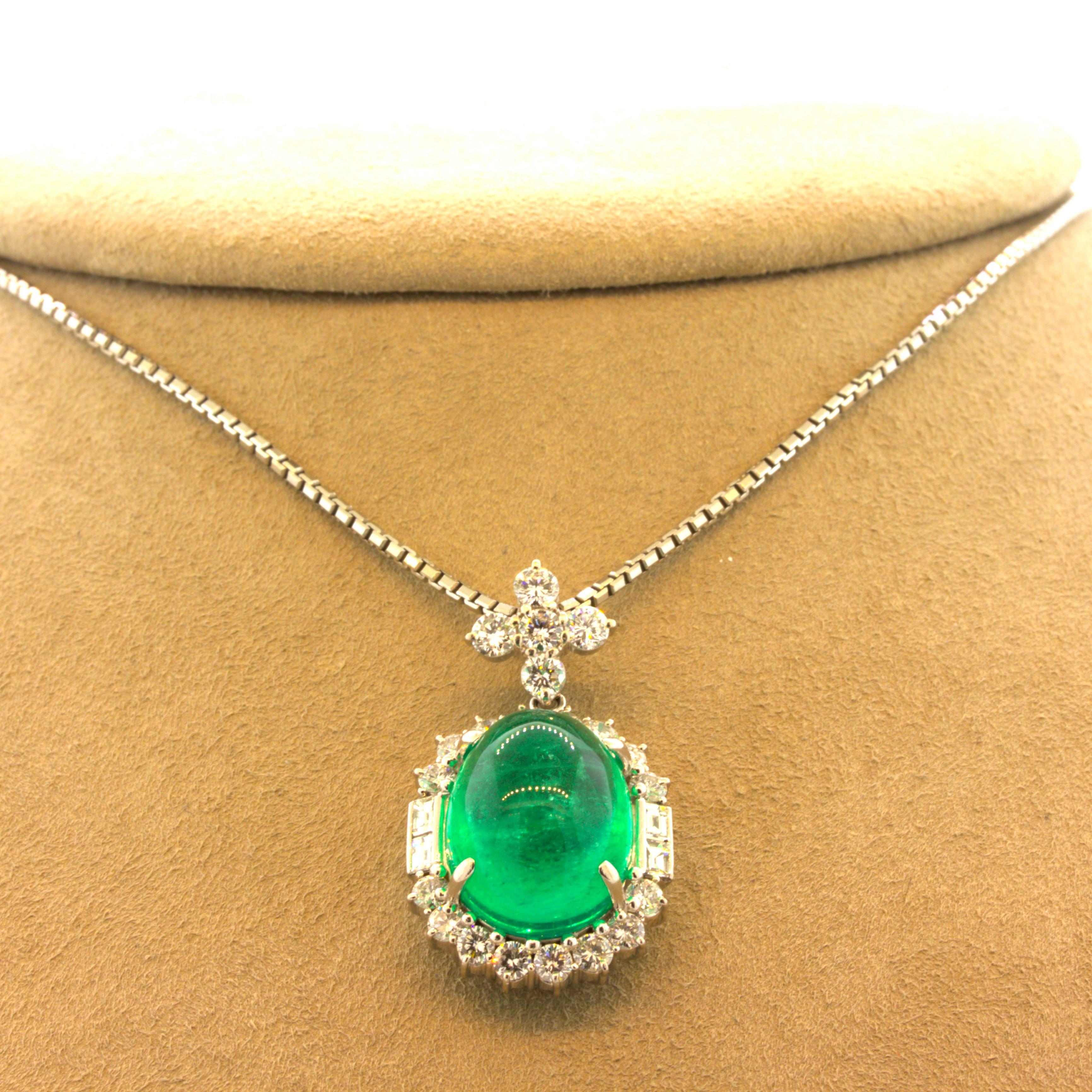 A chic and substantial pendant featuring a large and impressive Colombian emerald. The emerald weighs 14.22 carats and has a bright lively grass green color Colombian emeralds are known for. Adding to that, it is certified by the GIA as natural with